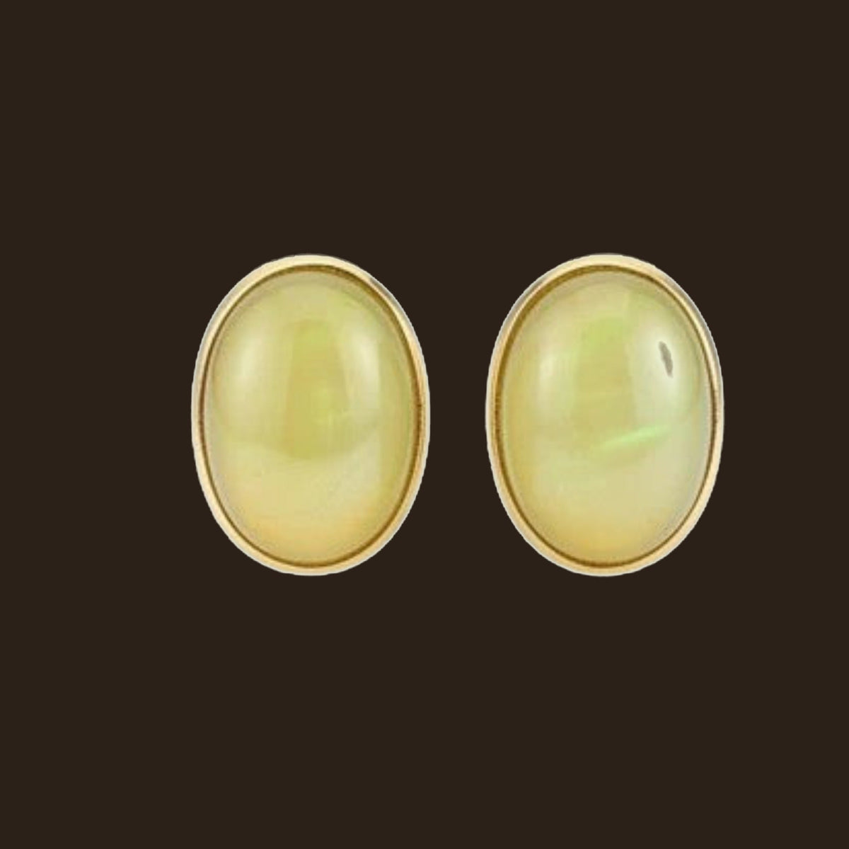 Golden opal stud earrings in solid 14K gold on an espresso background, an October birthstone gift