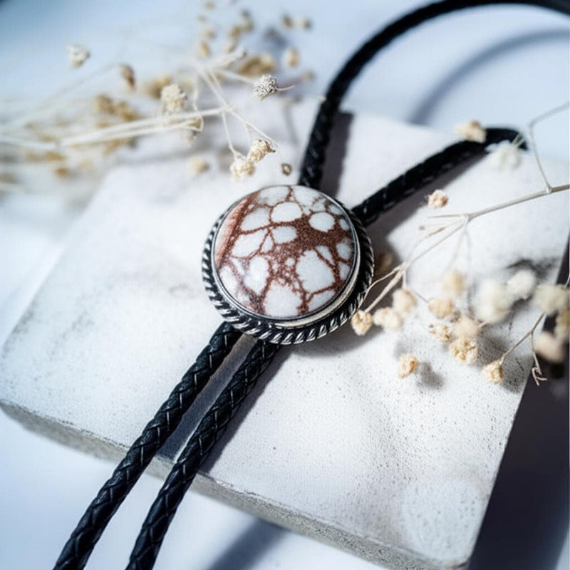 Handcrafted Navajo bolo ties with turquoise, White Buffalo, and Wild Horse stones