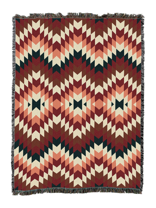 Sandy cotton throw in the Deep Teal colorway, a soft flame stitch zigzag of dusty rose and brick through cream over a dark teal base