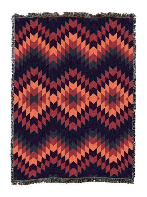 Sunset Desert cotton throw blanket in a high contrast flame stitch zigzag of coral and salmon against deep navy and brick red