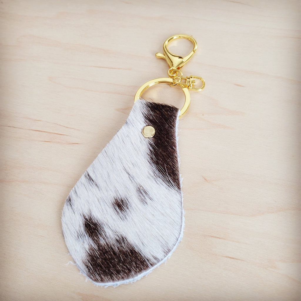 Brindle cowhide leather key chain in brown and white with gold hardware