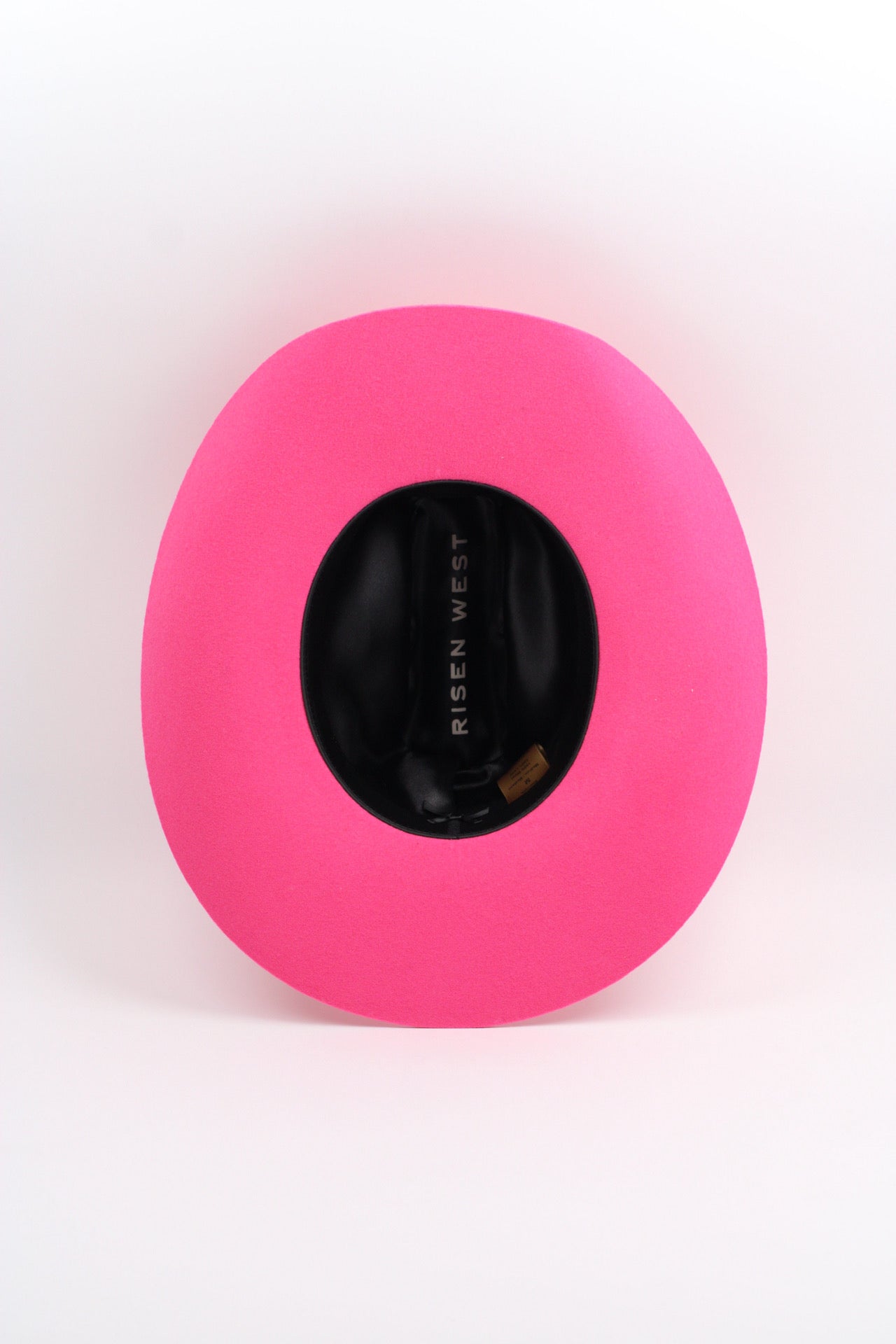 Pink Mustang cowboy hat showing the curved brim