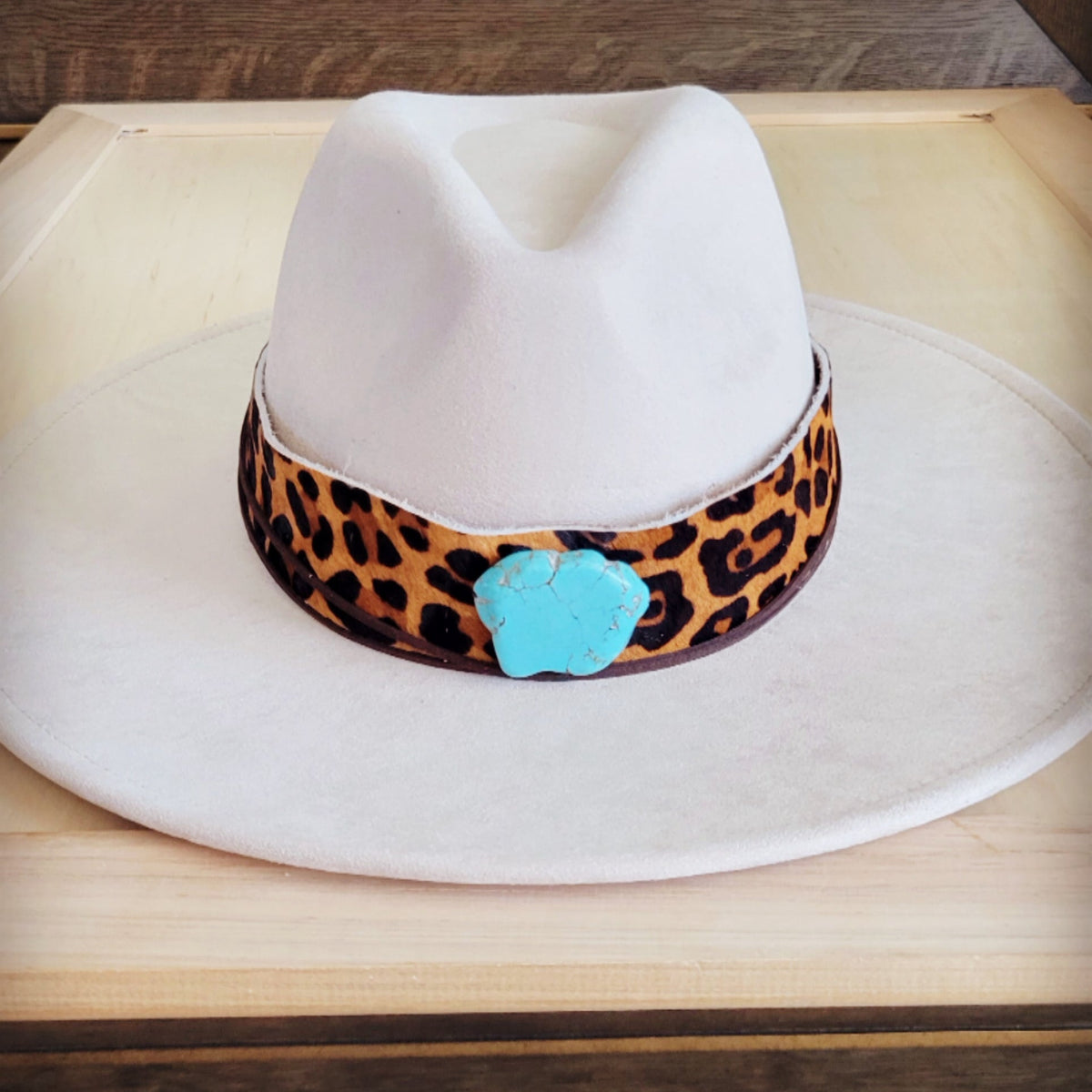 Leopard hair-on-hide hat band with a turquoise-look slab