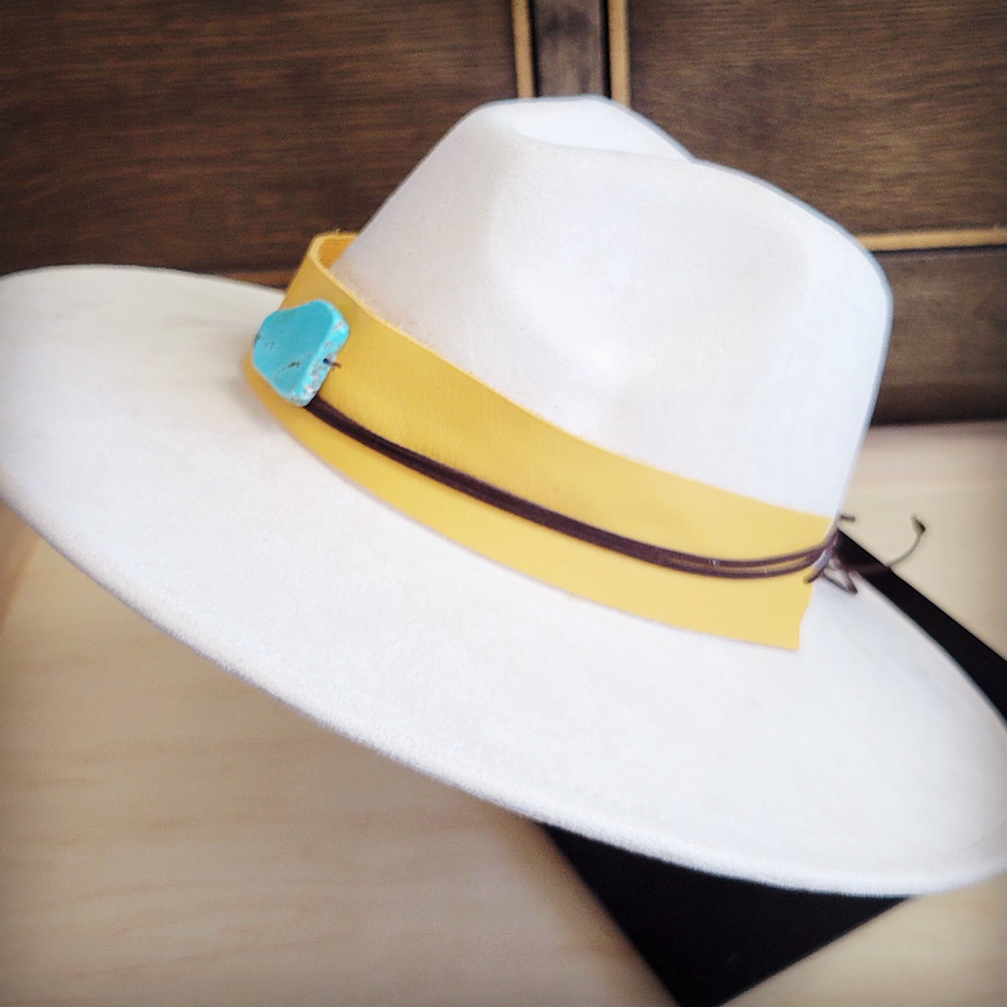 Mustard leather hat band with a turquoise-look slab, additional view