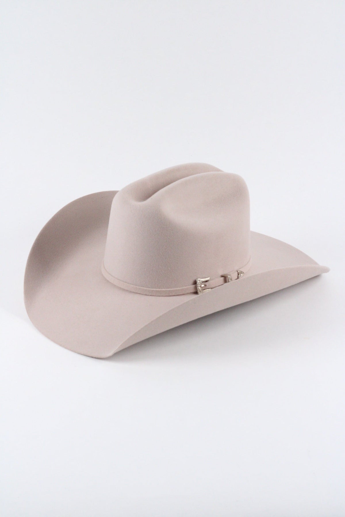 Desert sand Wren merino wool cowboy hat with a cattleman crown, three quarter view on a white background