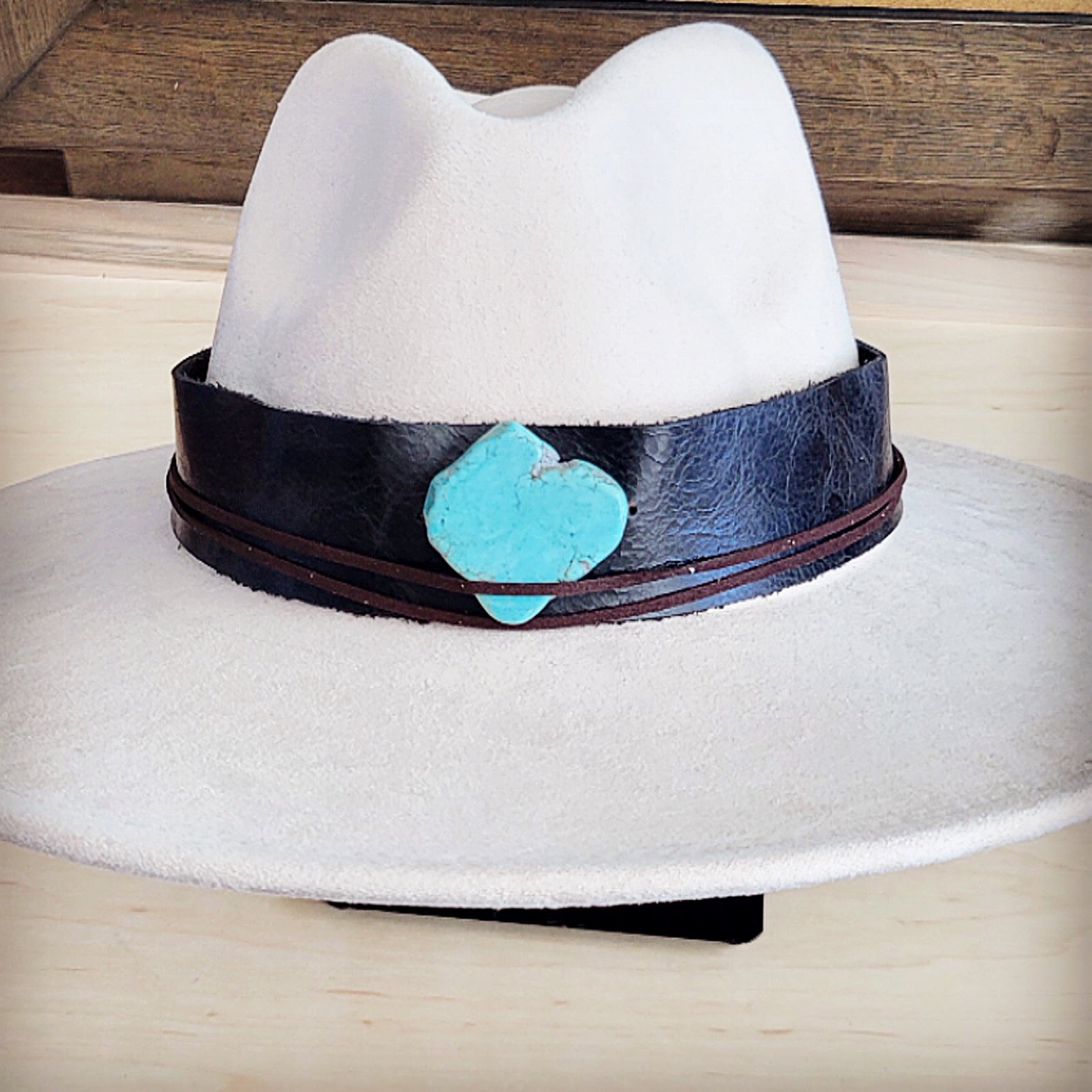 Black leather hat band with a turquoise-look slab