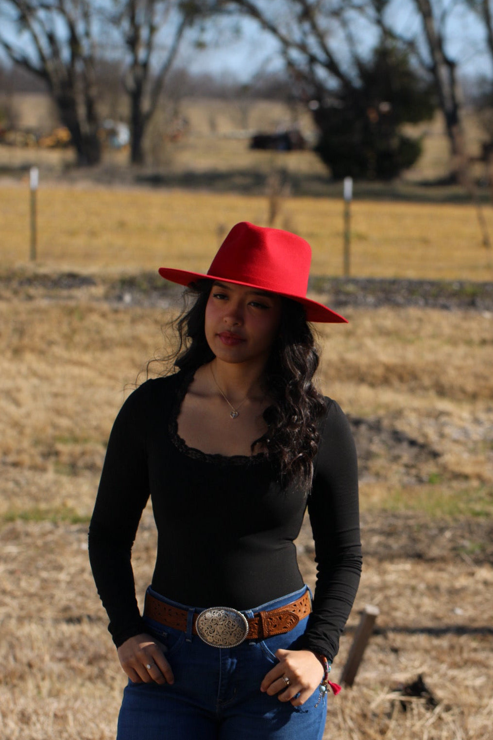 Red Rowan rancher hat showing the teardrop crown