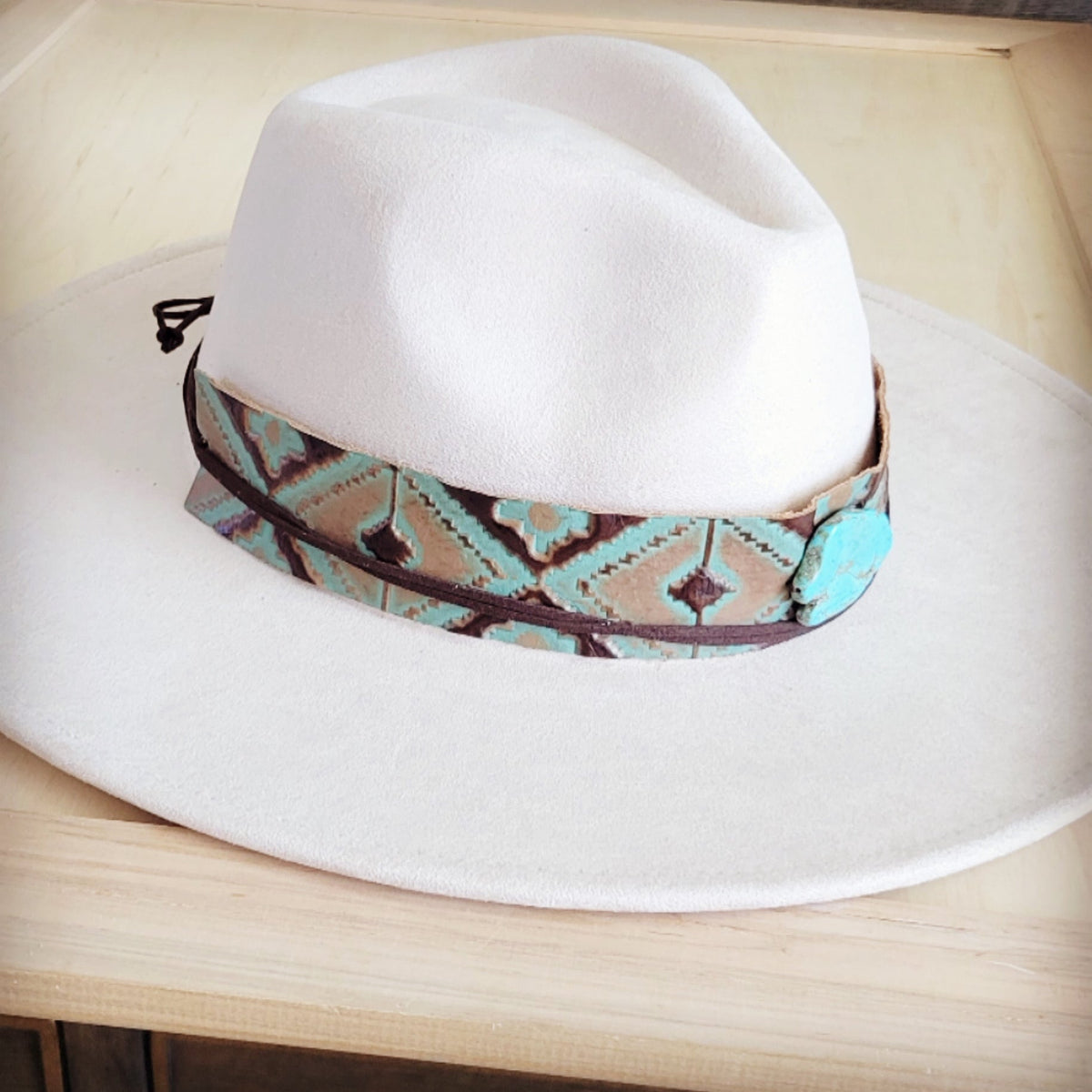 Southwest print tooled leather hat band with a turquoise-look slab, additional view