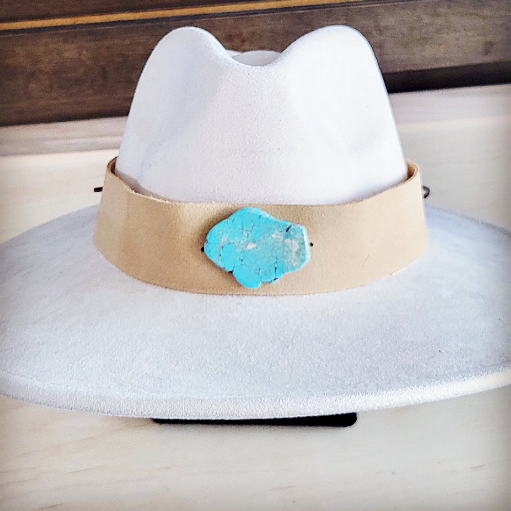 Bone suede hat band with a turquoise-look slab