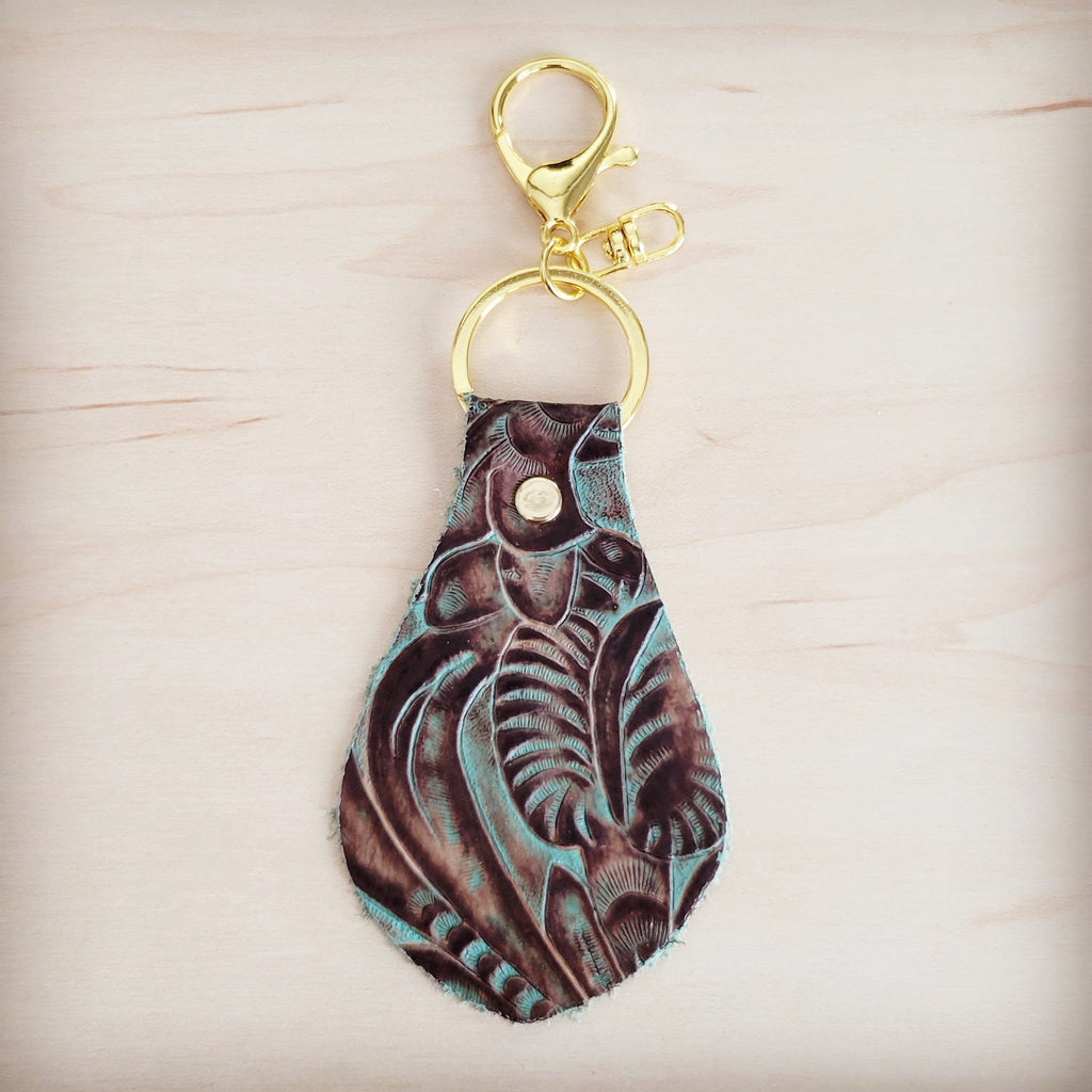 Turquoise and brown floral tooled leather key chain with gold hardware