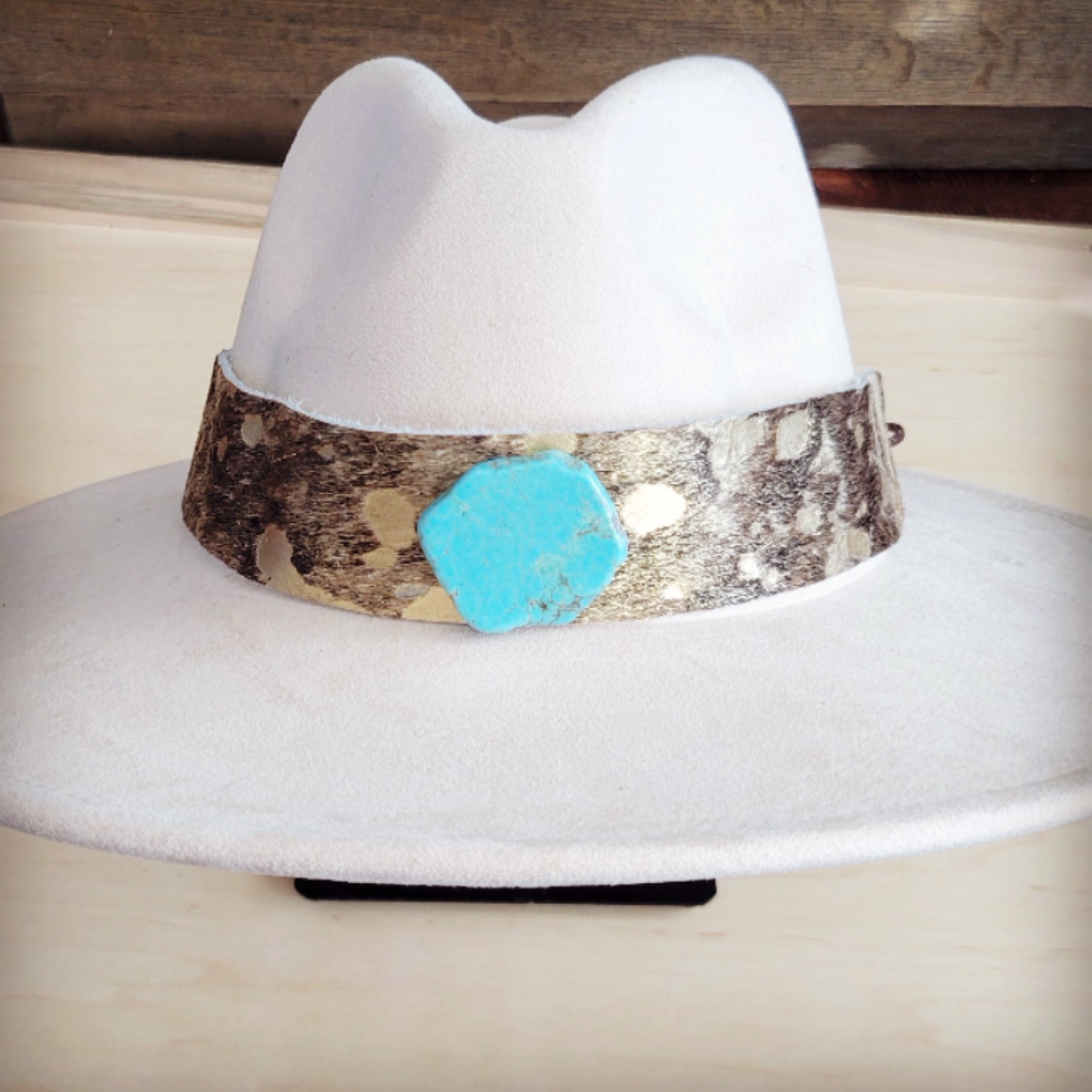 Gold metallic hair-on-hide hat band with a turquoise-look slab
