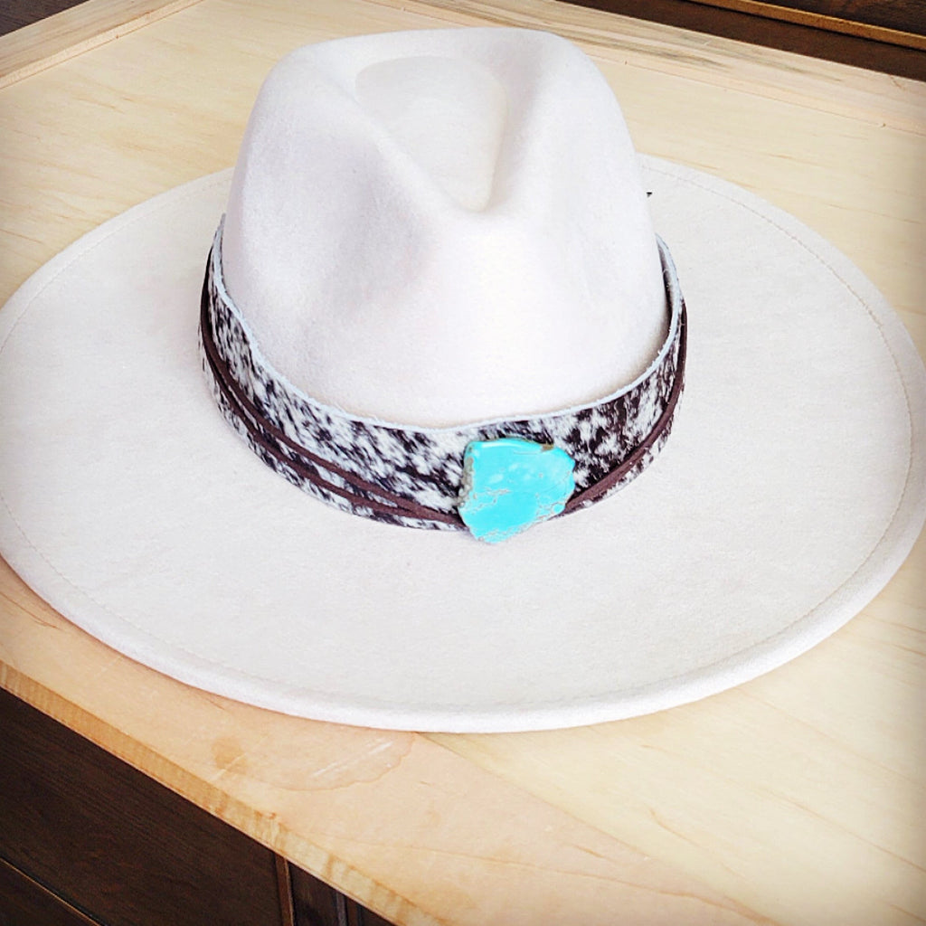 Black and white speckled hair-on-hide hat band with a turquoise-look slab, additional view