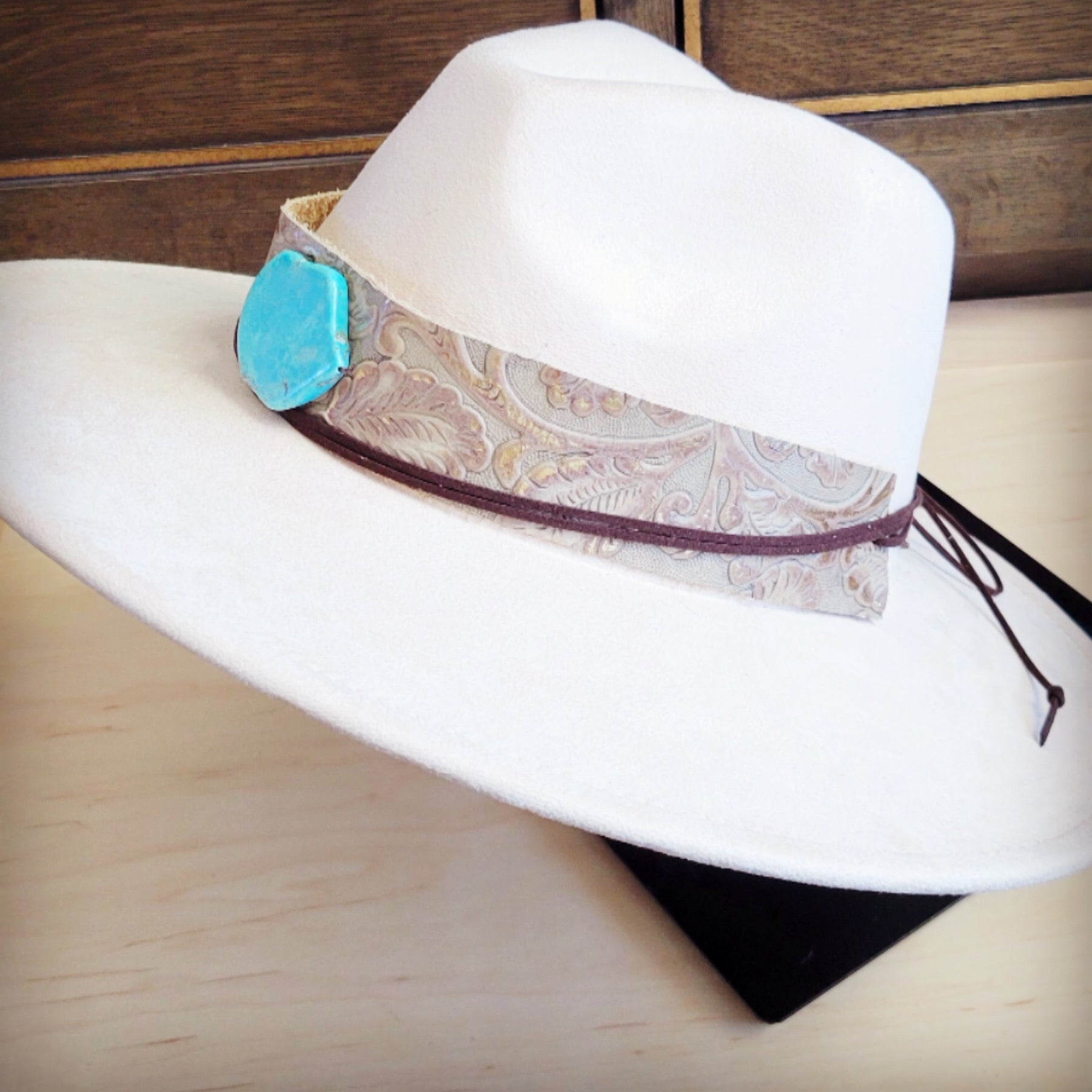 Pearl floral tooled leather hat band with a turquoise-look slab, additional view