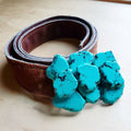 Medium turquoise slab belt buckle on a silver-tone frame
