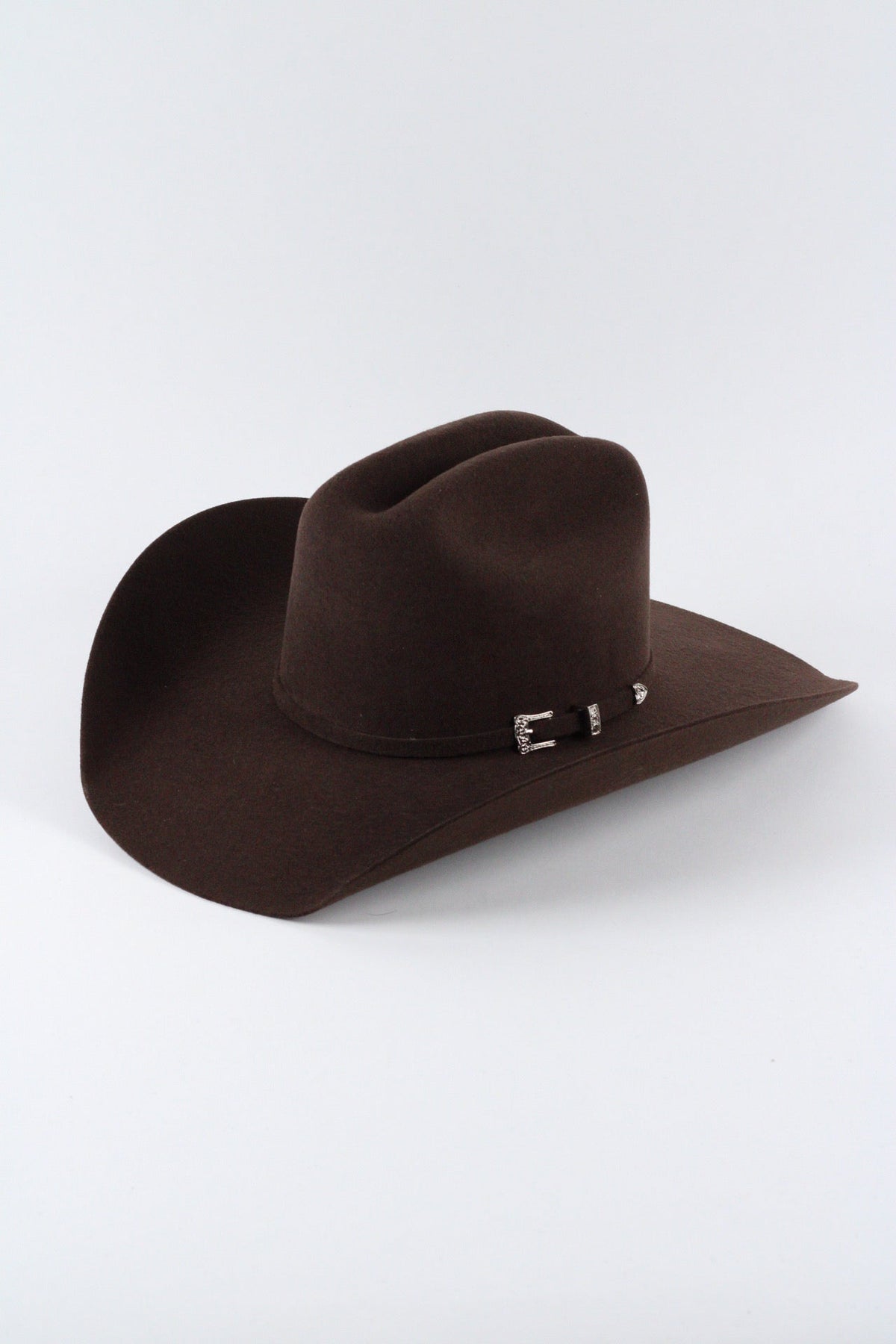 Chocolate brown Wren merino wool cowboy hat with a cattleman crown, three quarter view on a white background