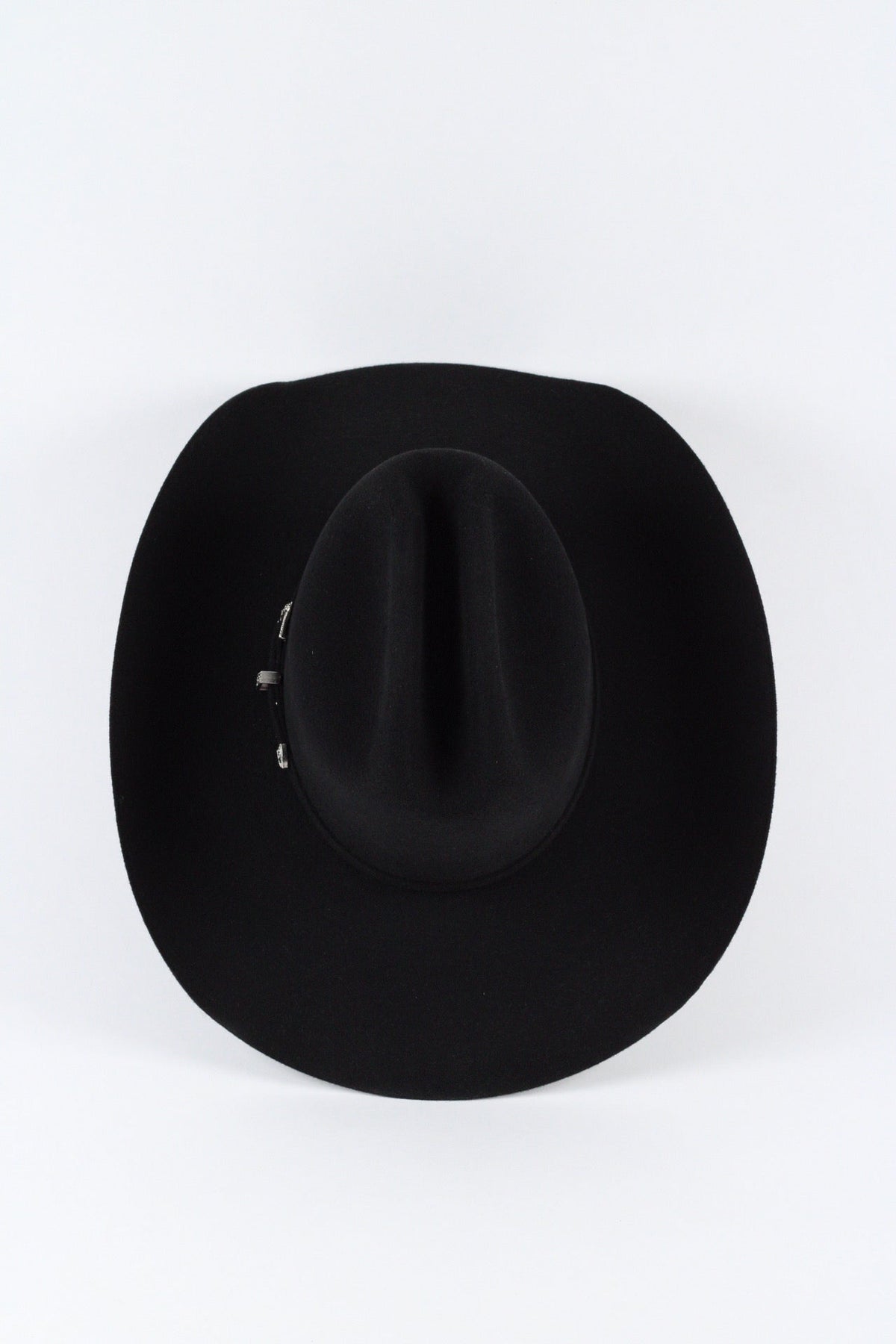 Top view of the black Wren cowboy hat showing the creased cattleman crown and silver-tone buckle