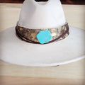 Gold metallic hair-on-hide hat band with a turquoise-look slab, additional view