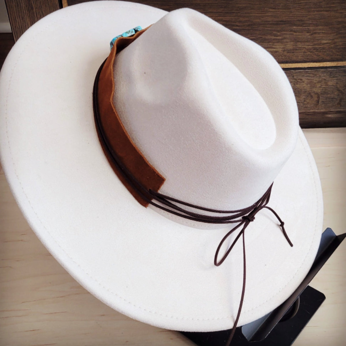 Cognac suede hat band with a turquoise-look slab, additional view