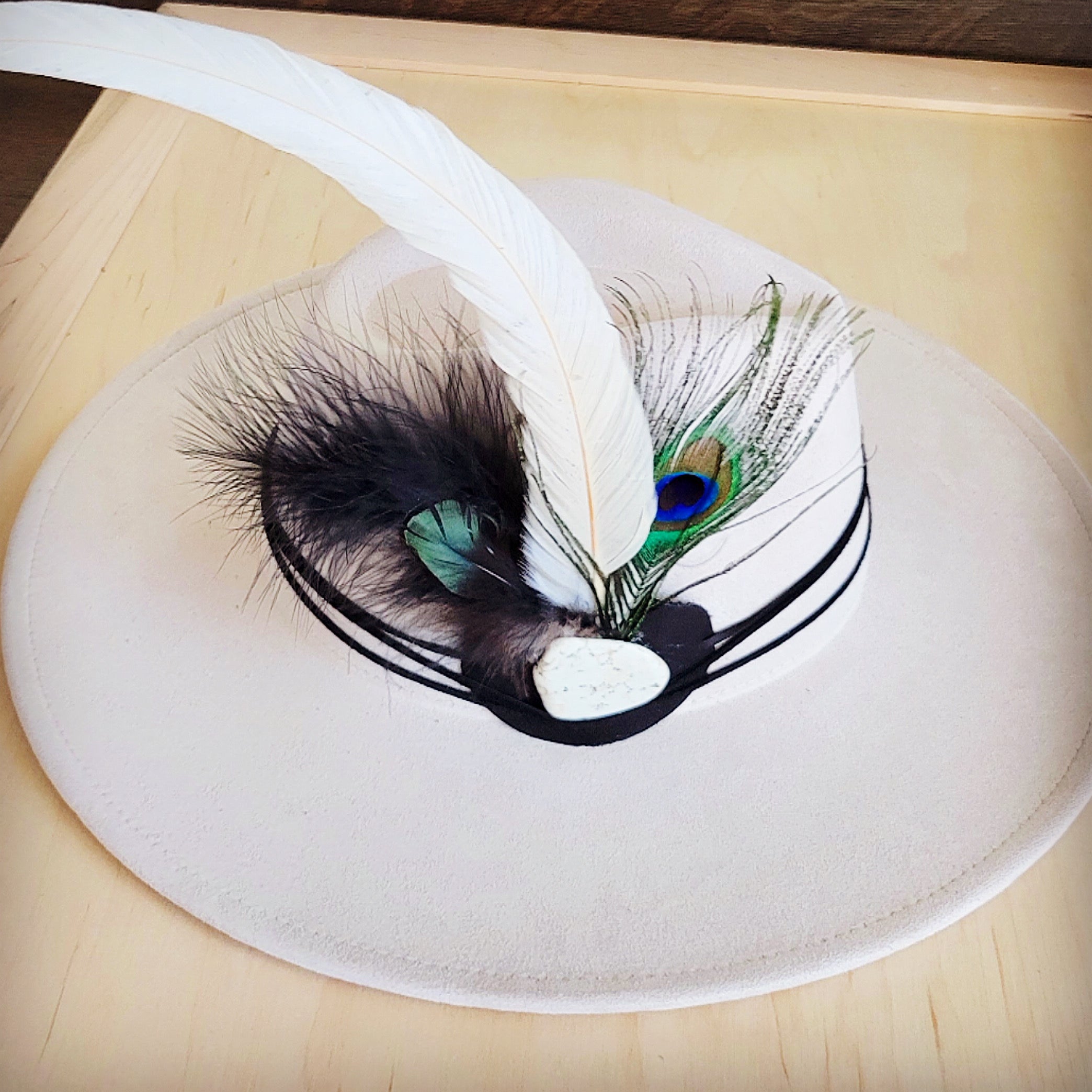 Leather hat band with peacock and white feathers and turquoise