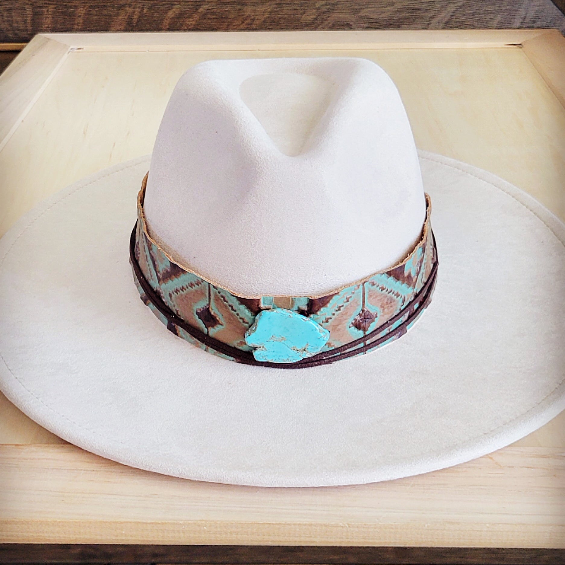 Southwest print tooled leather hat band with a turquoise-look slab