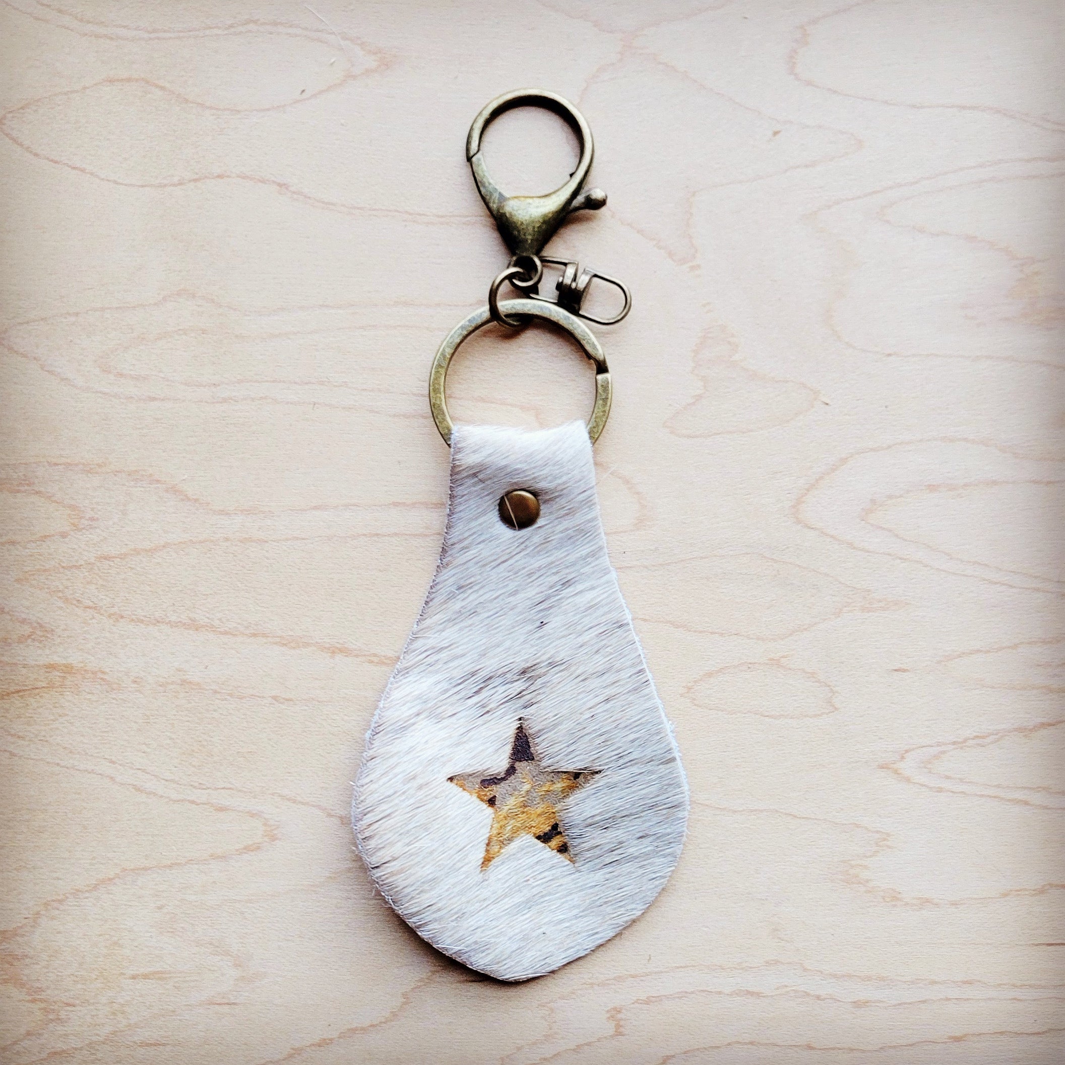 Back of the white hair-on-hide leather key chain showing the leather backing