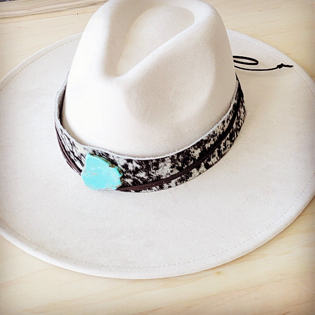Black and white speckled hair-on-hide hat band with a turquoise-look slab, additional view