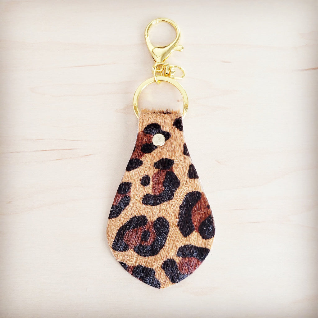 Leopard print hair-on-hide leather key chain with gold hardware