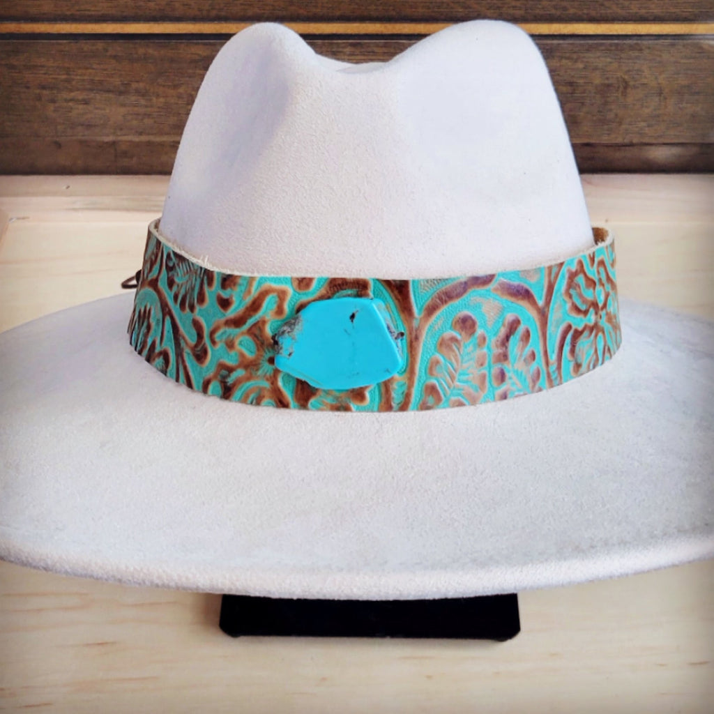 Turquoise and brown floral tooled leather hat band with a slab