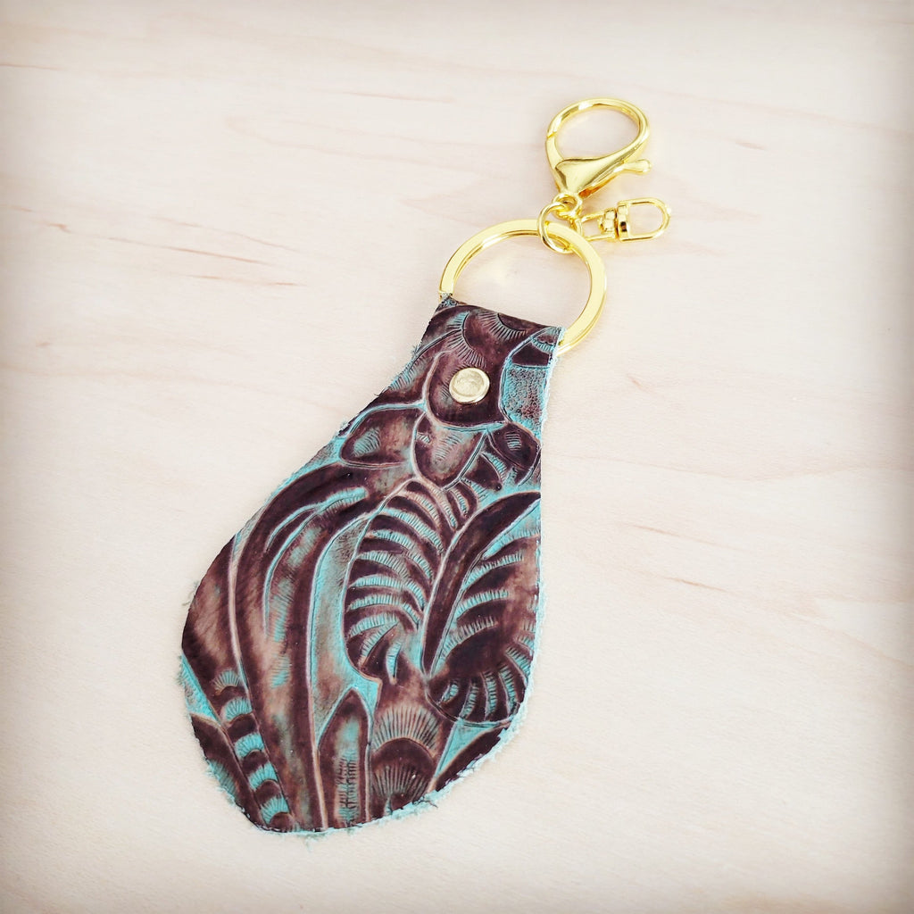 Back of the floral tooled leather key chain showing the leather backing