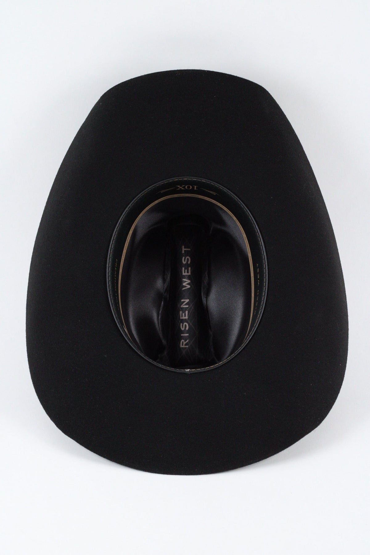 Underside of the black Wren cowboy hat showing the brim, sweatband and satin lining