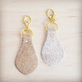 Light tan hair-on-hide leather key chain with gold hardware