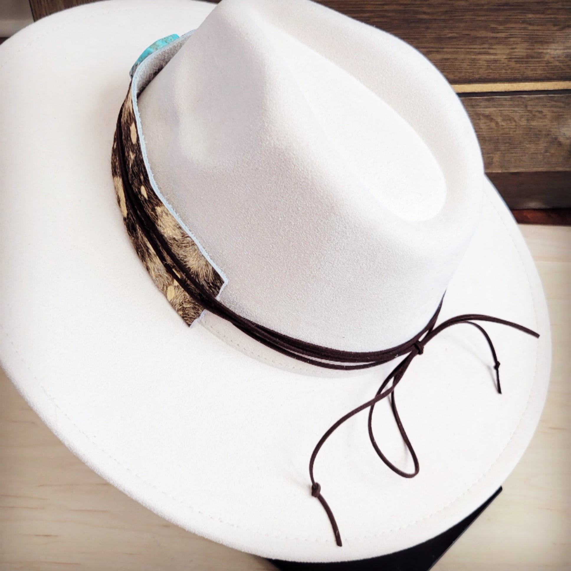 Gold metallic hair-on-hide hat band with a turquoise-look slab, additional view