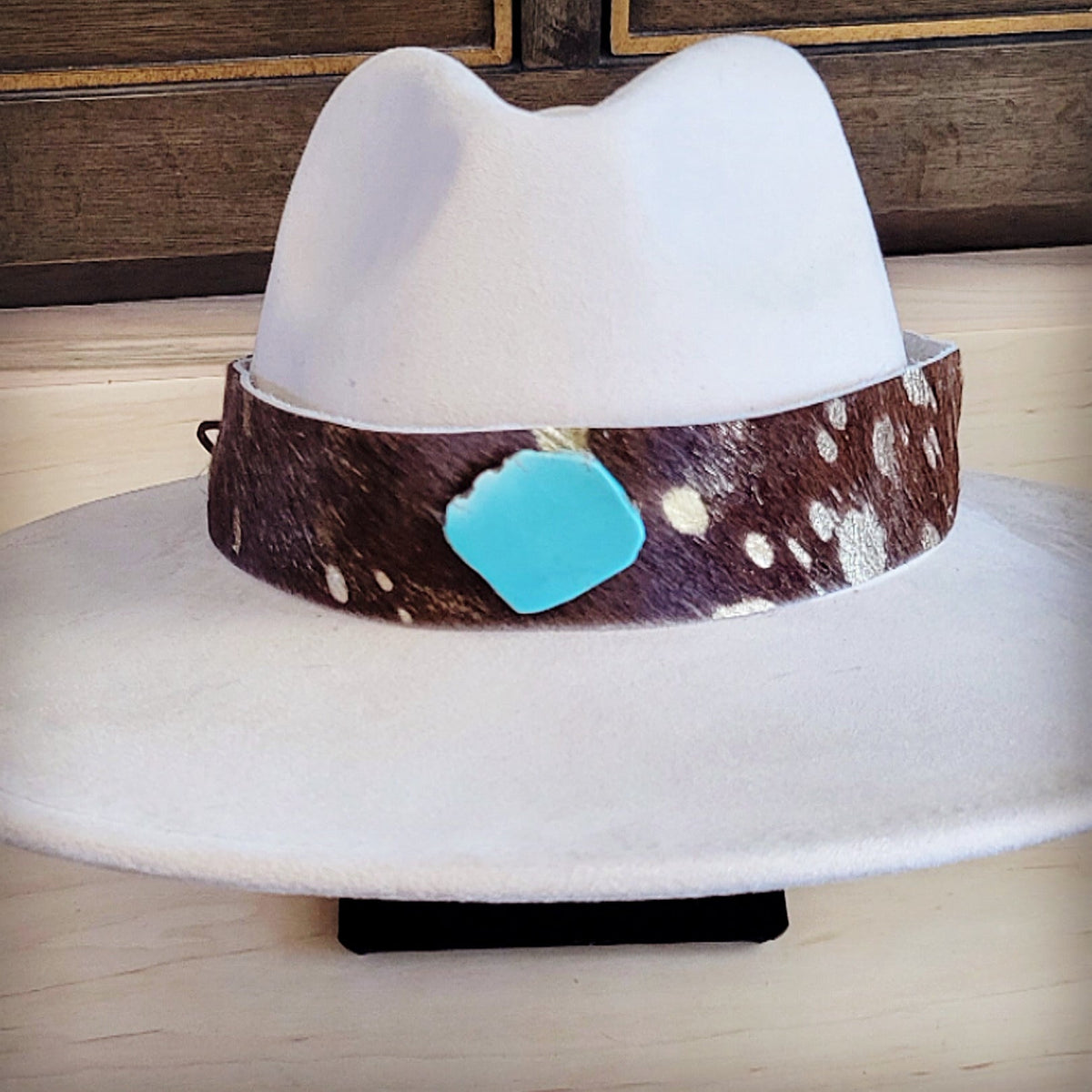 Gold metallic hair-on-hide hat band with a turquoise-look slab, additional view
