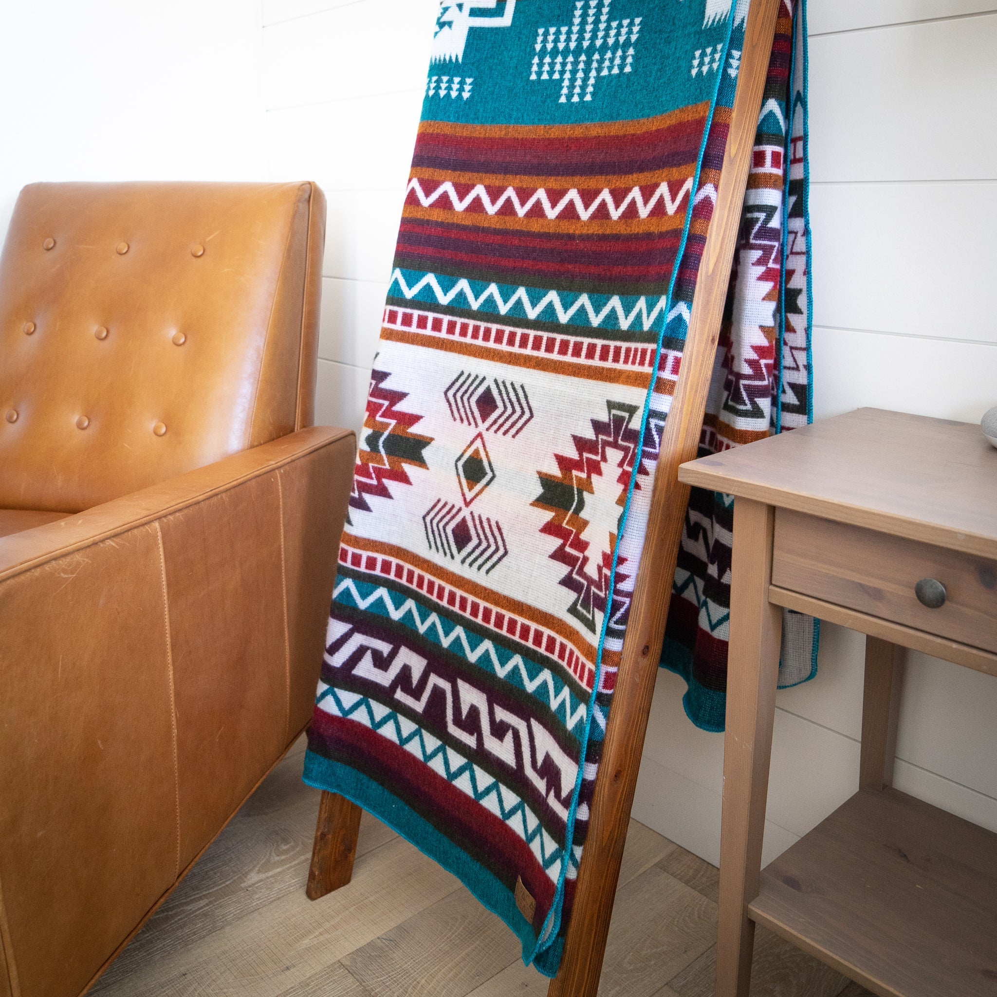 Turquoise, red and cream geometric alpaca blanket