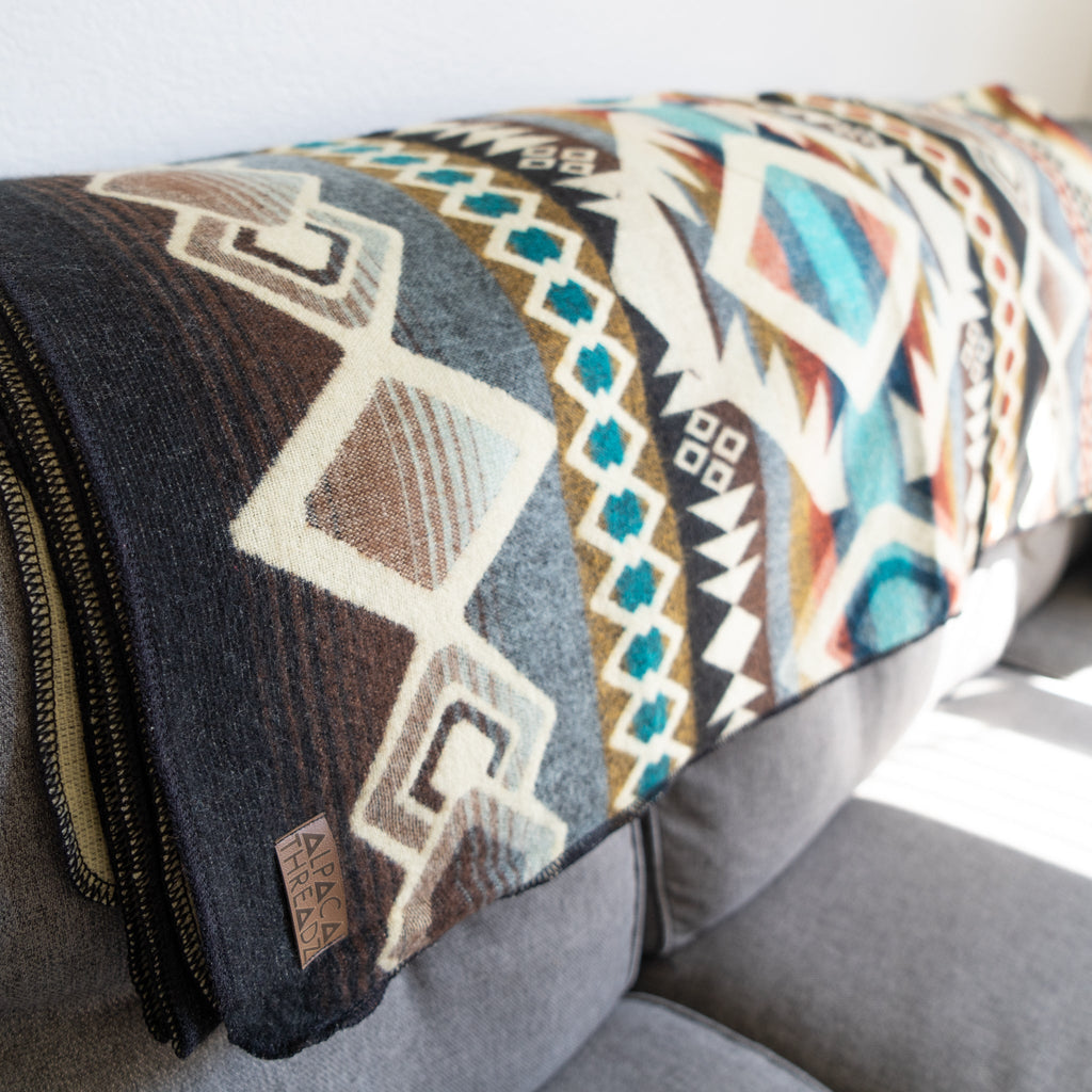 Camel, cream and turquoise geometric alpaca blanket, view 4