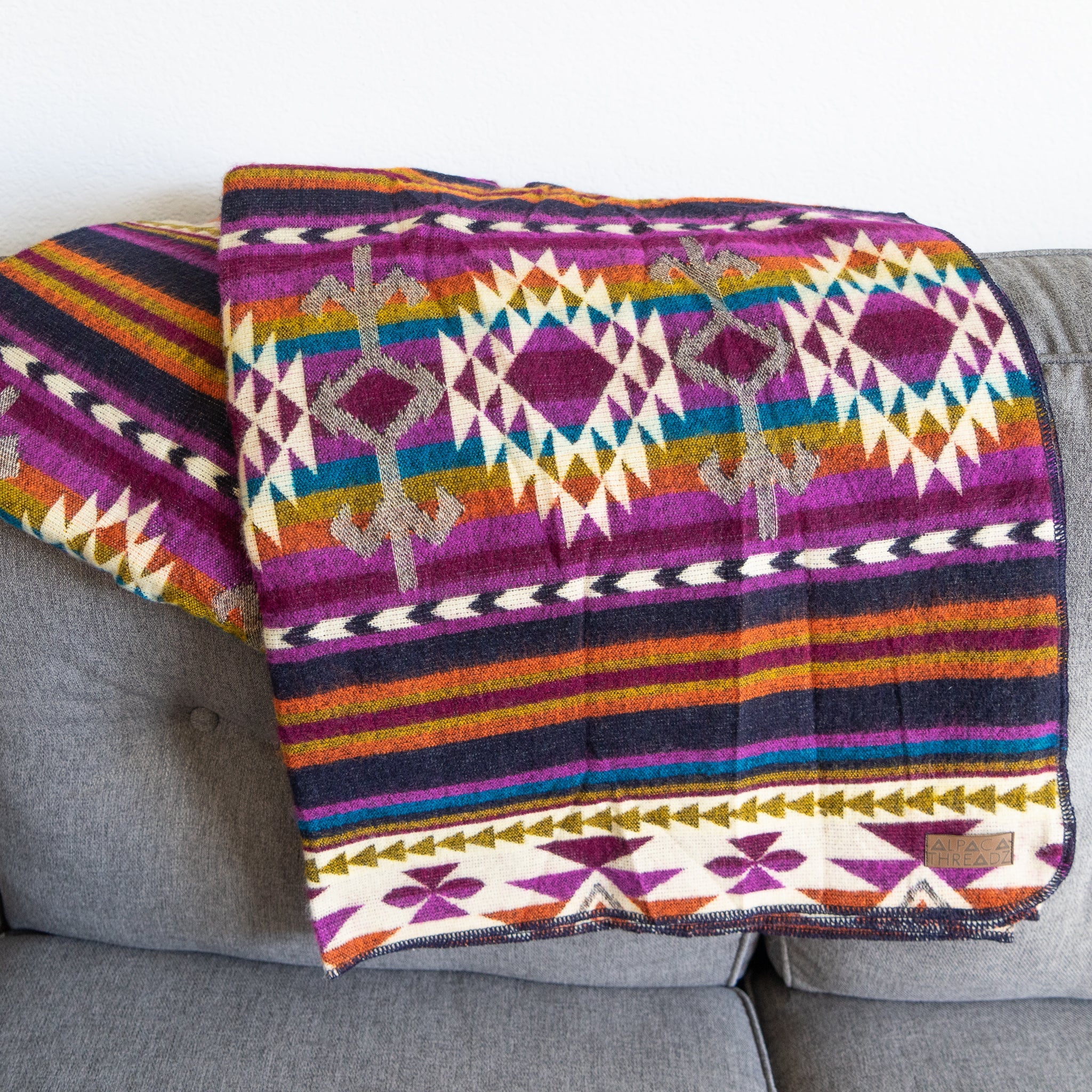 Purple and magenta geometric alpaca blanket