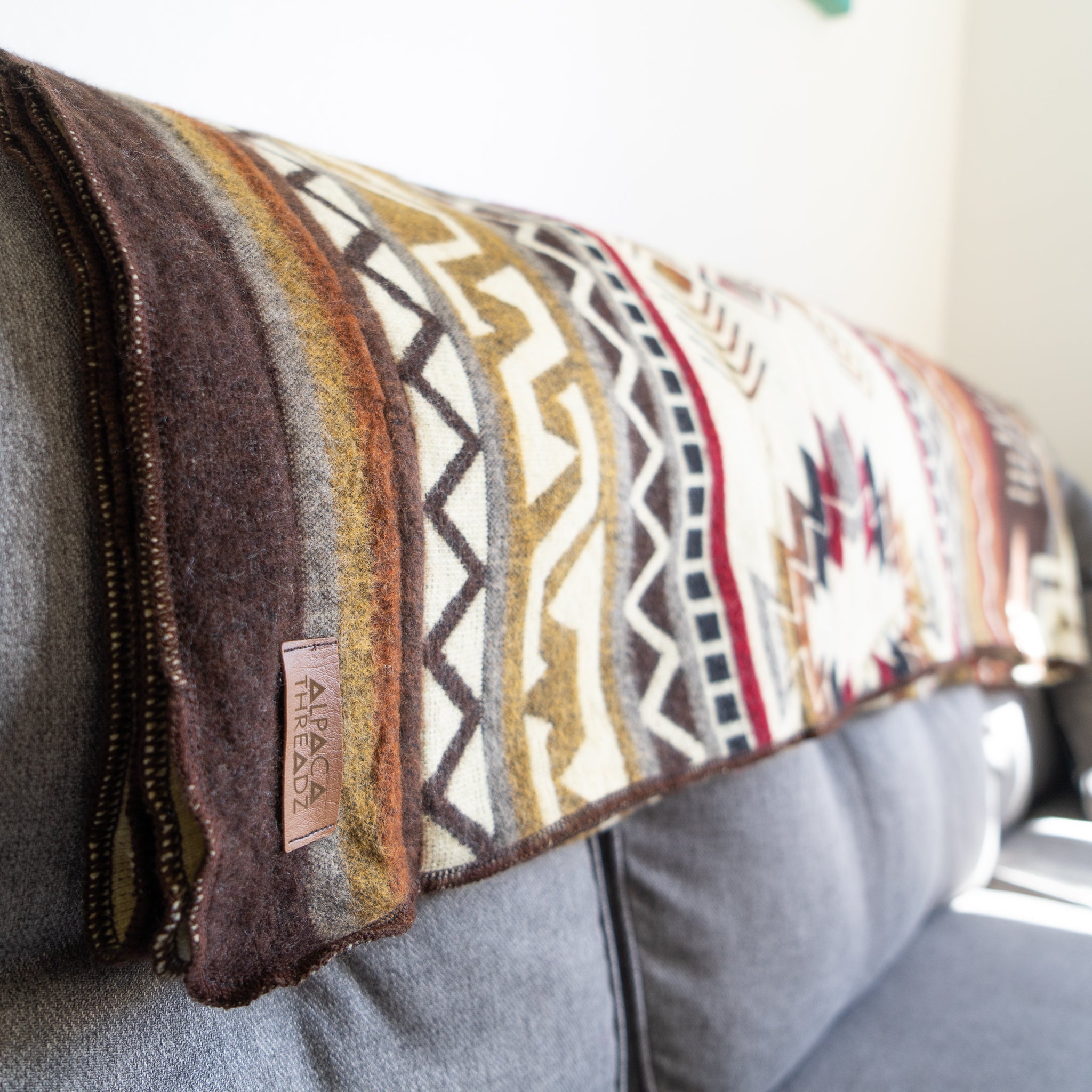 Cream, chocolate and wine geometric alpaca blanket, view 4