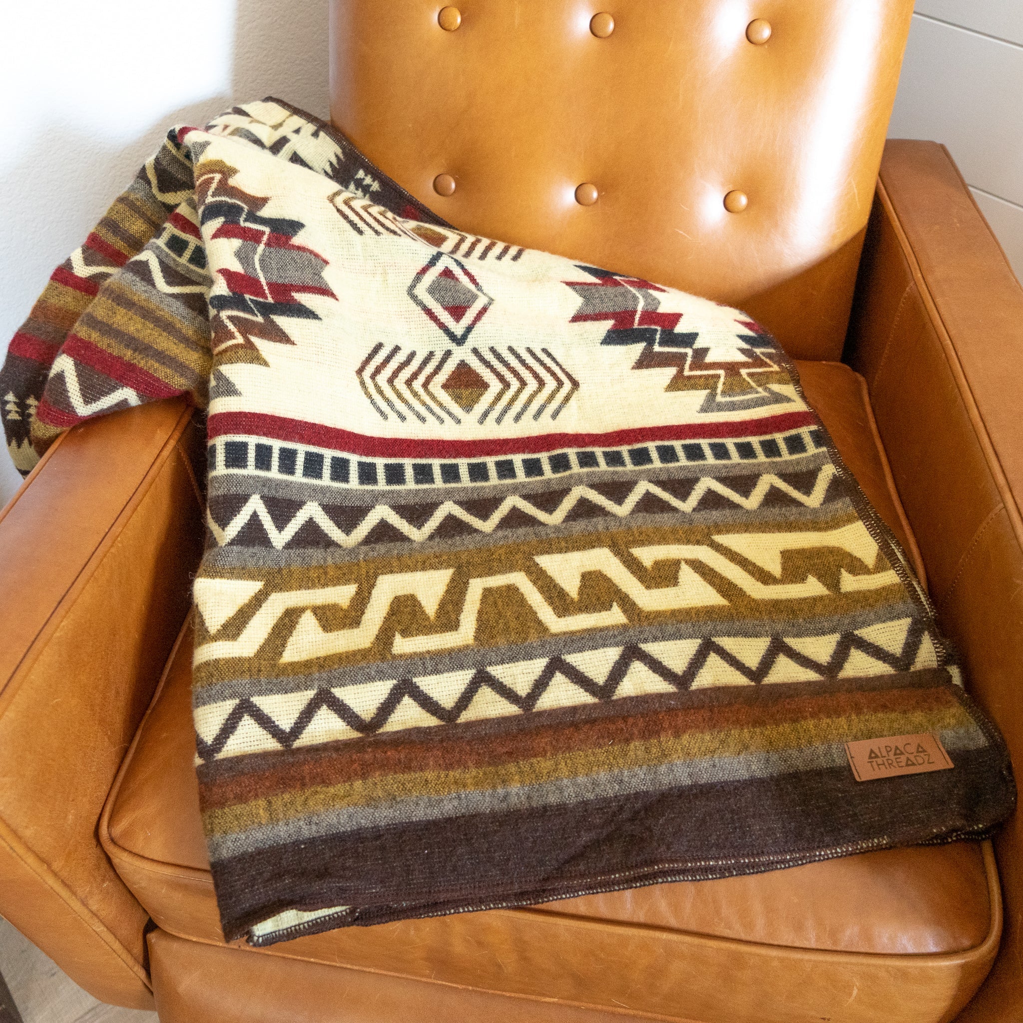 Cream, chocolate and wine geometric alpaca blanket