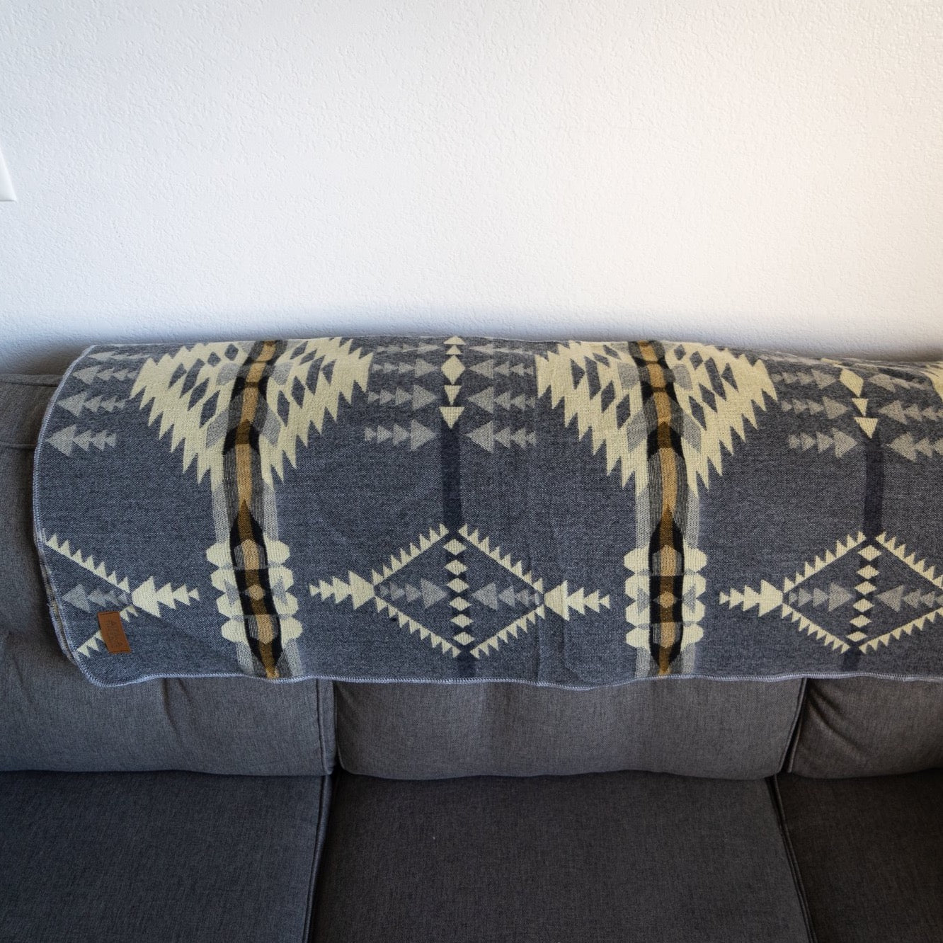 Soft grey and cream arrow and diamond alpaca blanket, view 4