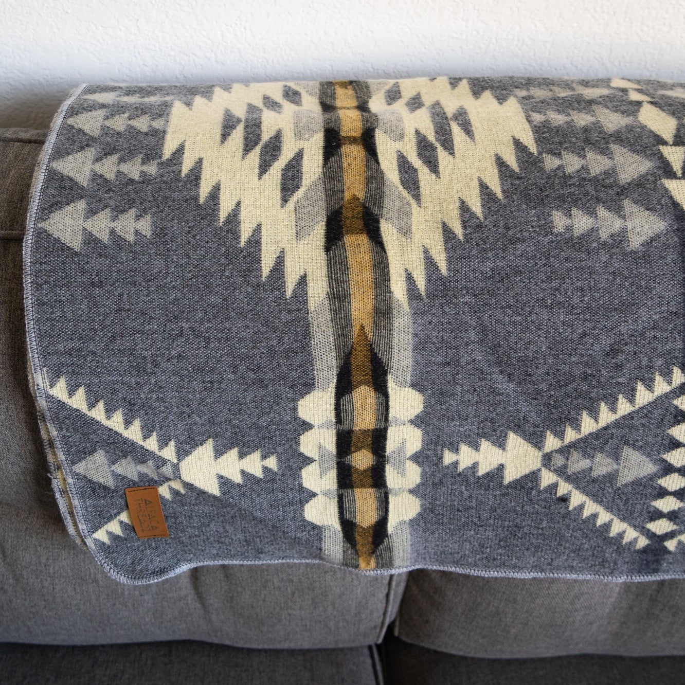 Soft grey and cream arrow and diamond alpaca blanket, view 5