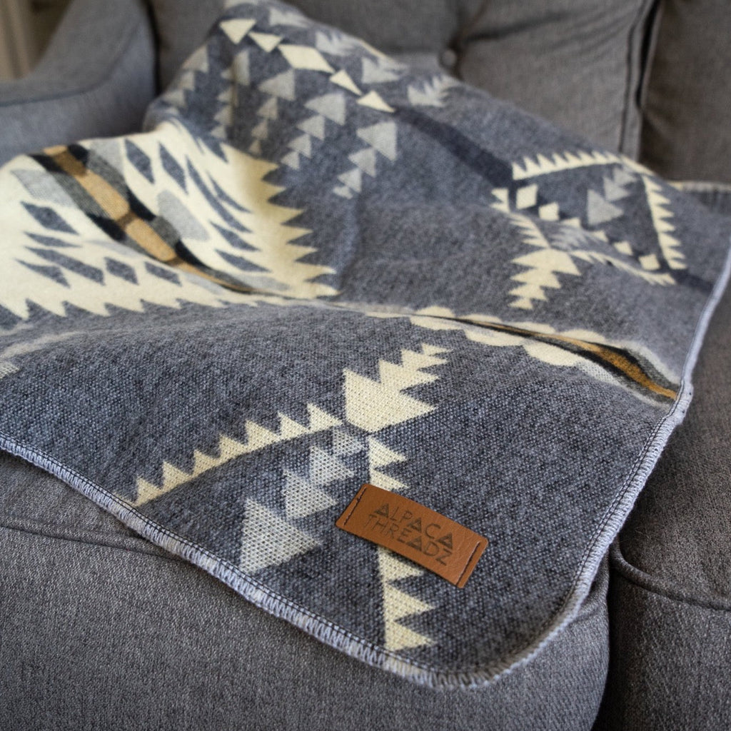 Soft grey and cream arrow and diamond alpaca blanket, view 6