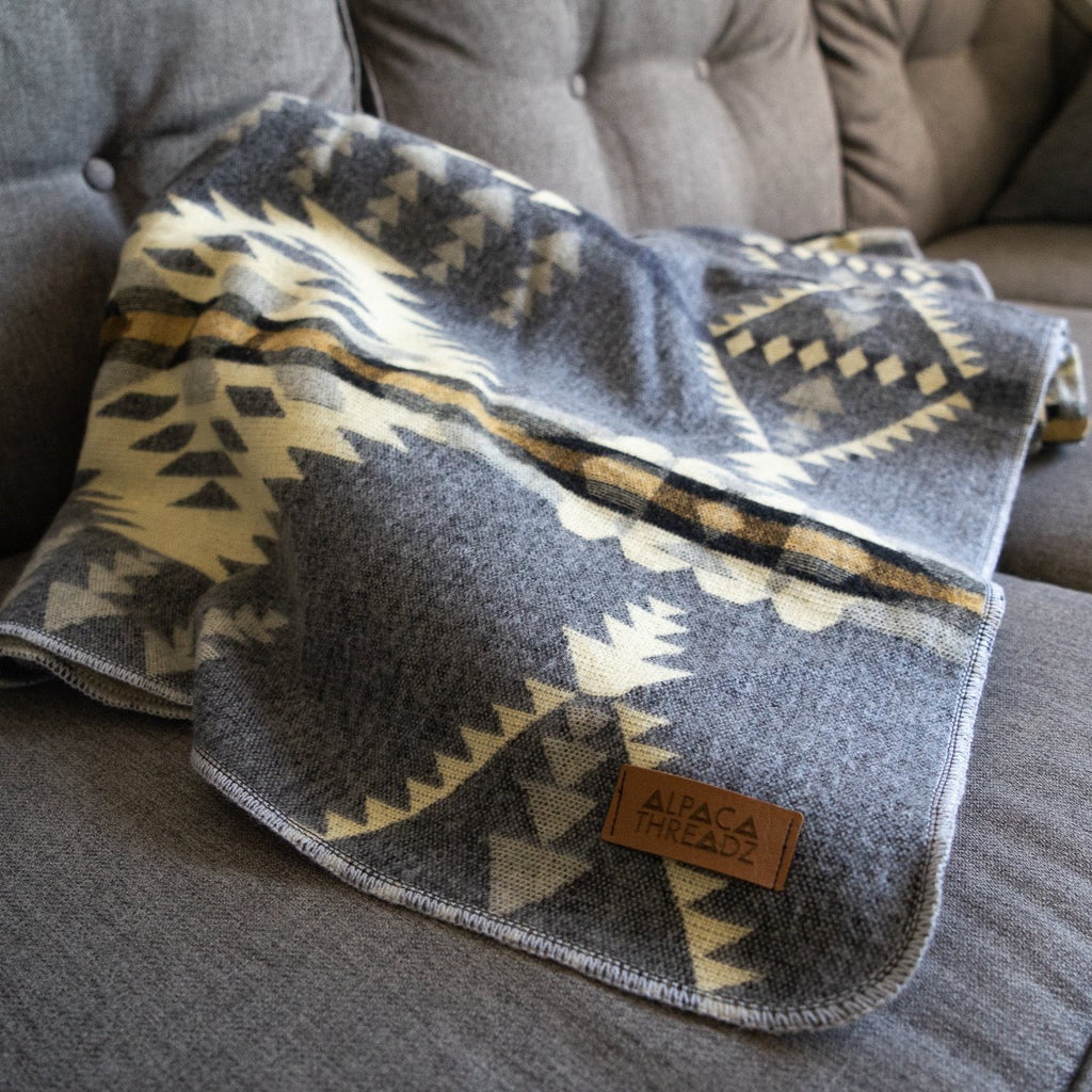 Soft grey and cream arrow and diamond alpaca blanket, view 8