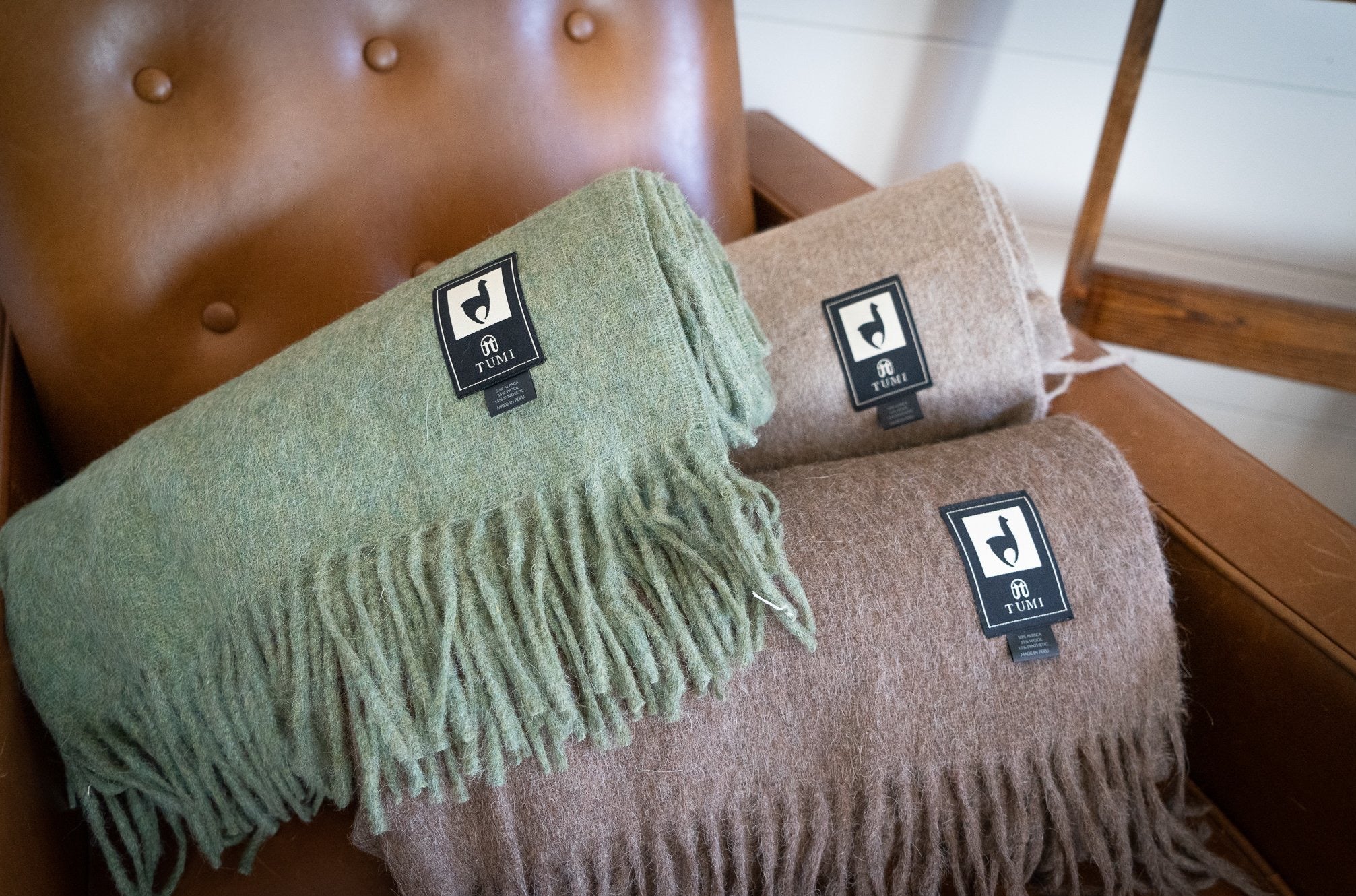 Solid color Peruvian alpaca fringe throw, view 3