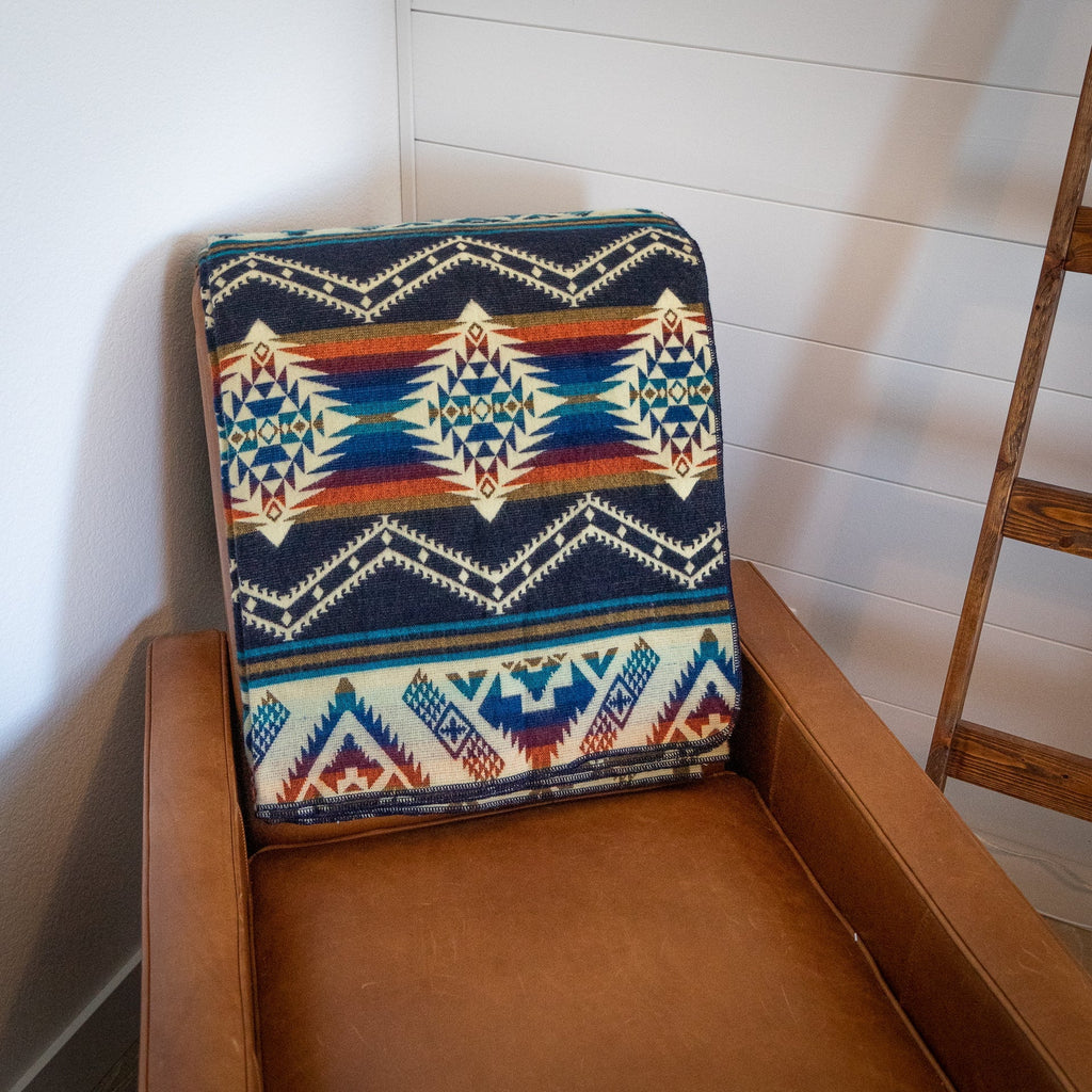 Navy, teal, rust and gold layered geometric alpaca blanket, view 4