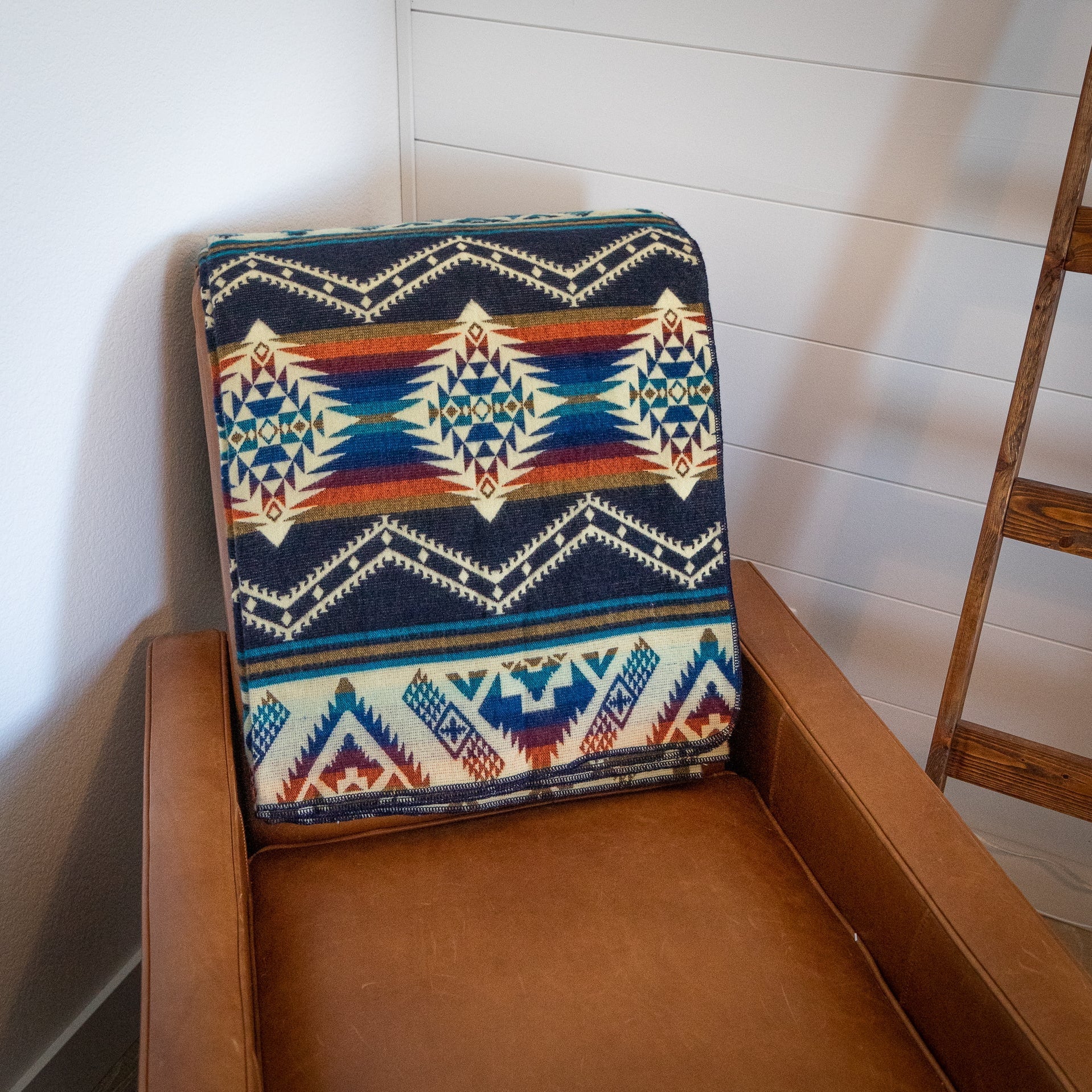 Navy, teal, rust and gold layered geometric alpaca blanket, view 4