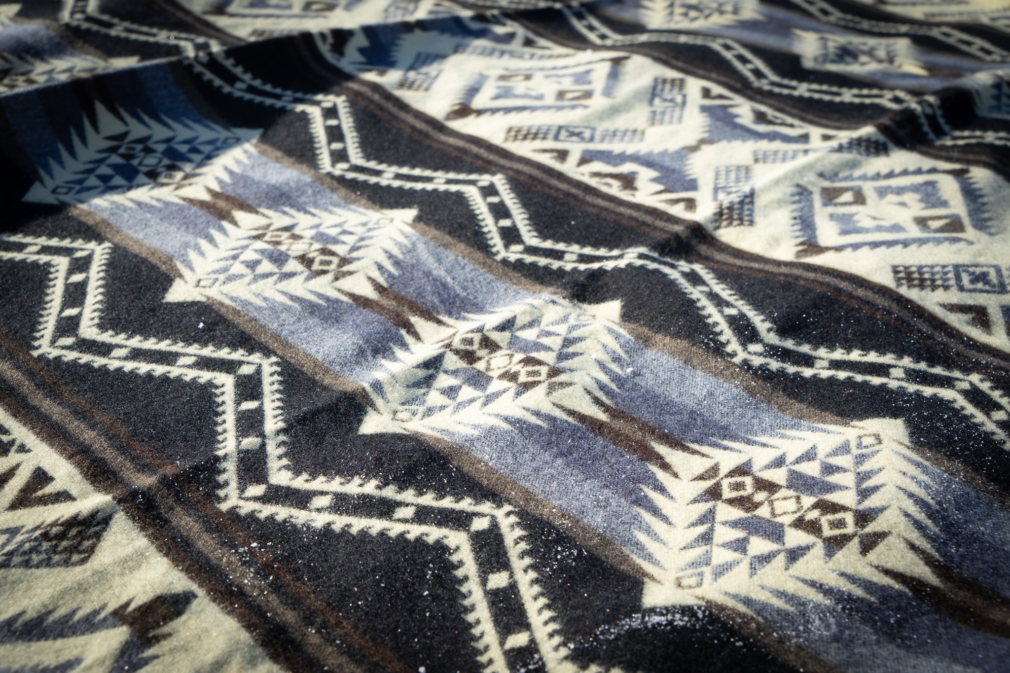 Black and cream monochrome geometric alpaca blanket, view 7