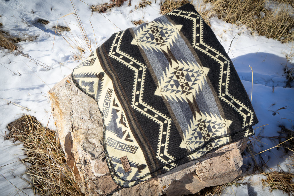 Black and cream monochrome geometric alpaca blanket, view 11