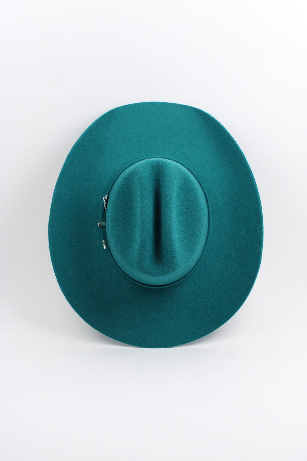 Turquoise Mustang cowboy hat showing the curved brim