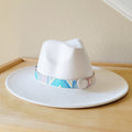 Pastel Navajo embossed leather hat band with a turquoise slab