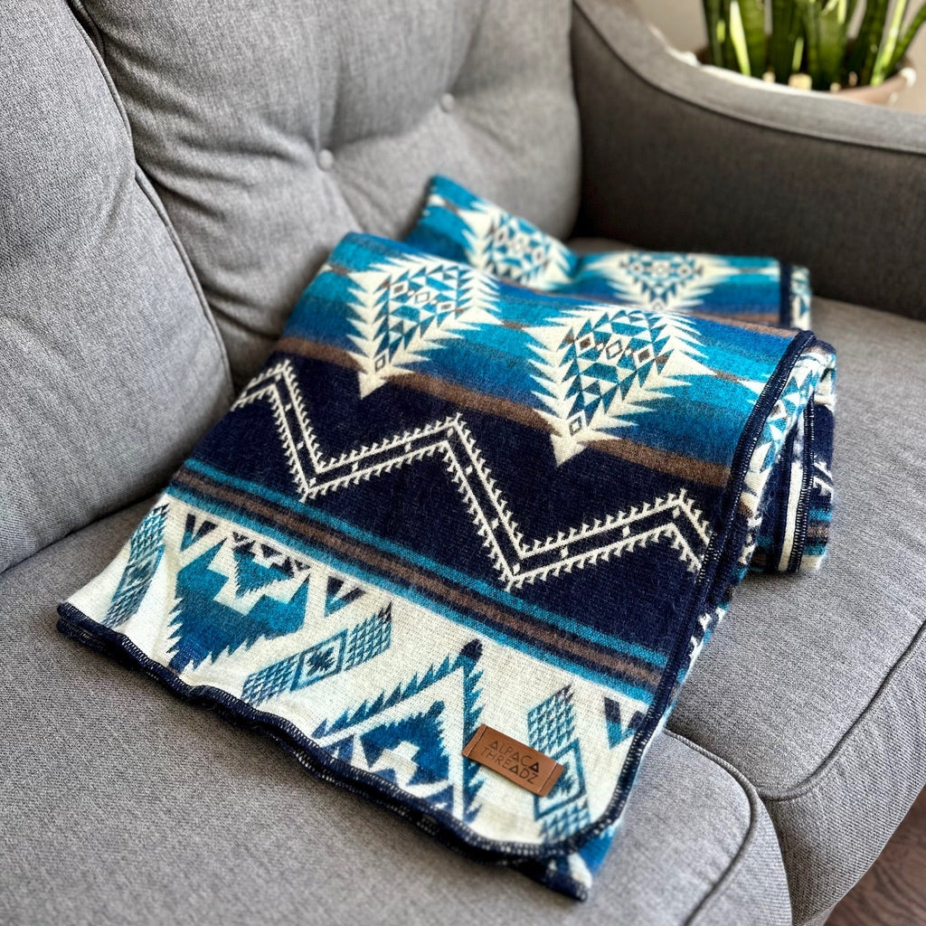 Cobalt and teal blue geometric alpaca blanket, view 9